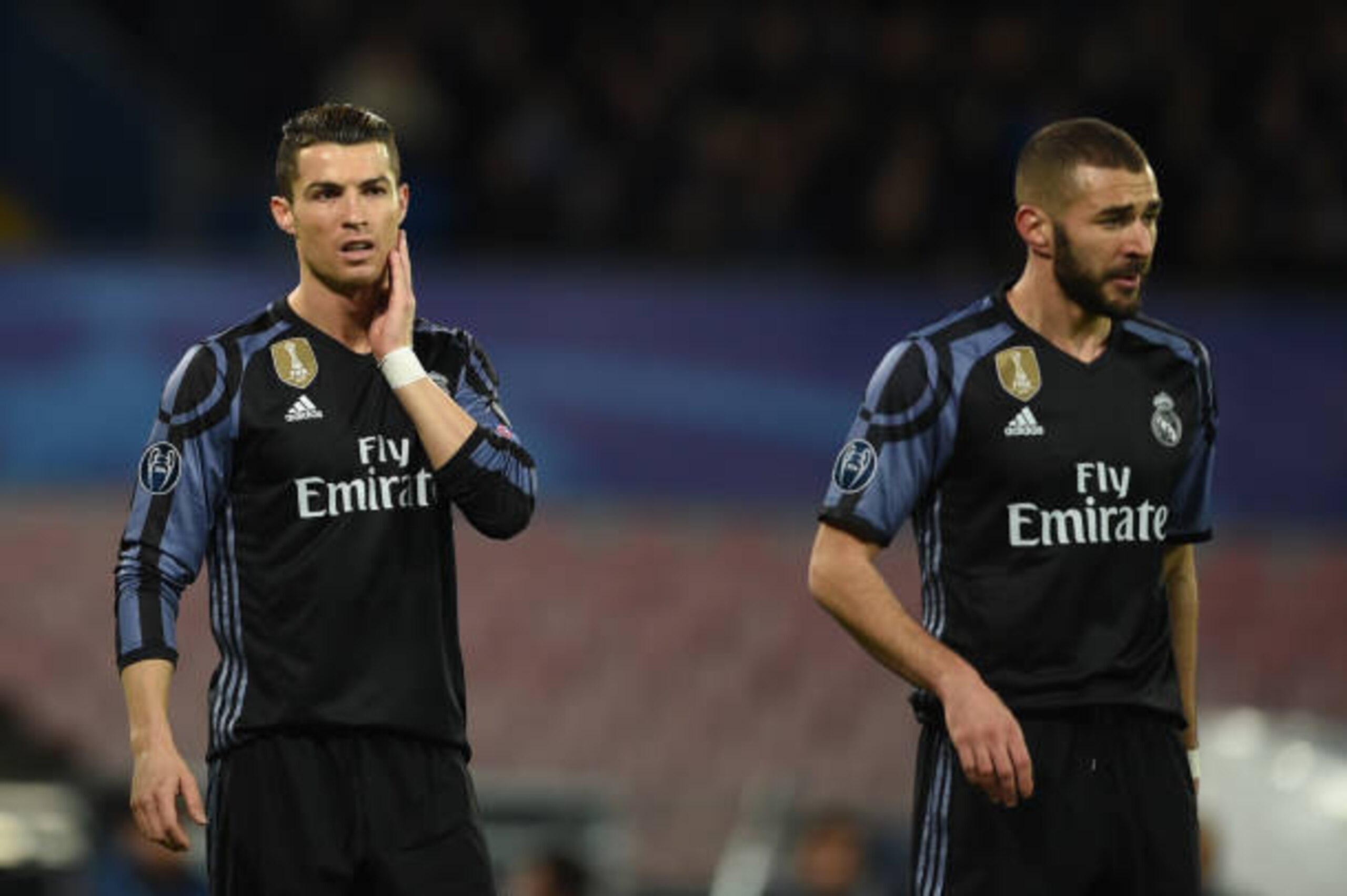 Real Madrid's Portuguese forward Cristiano Ronaldo and Real Madrid's French forward Karim Benzema (R) look on during the UEFA Champions League football match SSC Napoli vs Real Madrid on March 7, 2017 at the San Paolo stadium in Naples. Real Madrid won 1- Real Madrid's Portuguese forward Cristiano Ronaldo and Real Madrid's French forward Karim Benzema (R) look on during the UEFA Champions League football match SSC Napoli vs Real Madrid on March 7, 2017 at the San Paolo stadium in Naples. Real Madrid won 1-