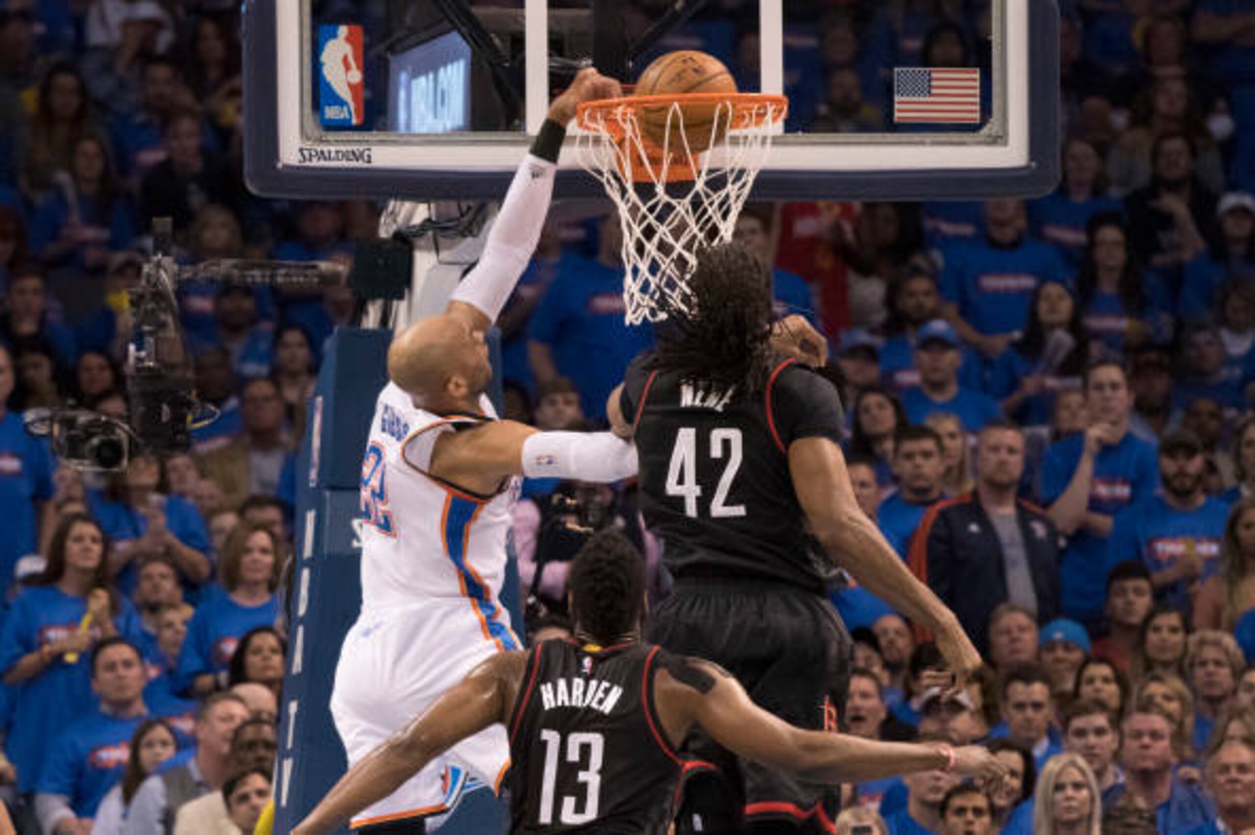 OKLAHOMA CITY, OK - APRIL 21: Taj Gibson #22 of the Oklahoma City Thunder goes over Nene Hilario #42 of the Houston Rockets for two points during the first half of Game Three in the 2017 NBA Playoffs Western Conference Quarterfinals on April 21, 2017 in OKLAHOMA CITY, OK - APRIL 21: Taj Gibson #22 of the Oklahoma City Thunder goes over Nene Hilario #42 of the Houston Rockets for two points during the first half of Game Three in the 2017 NBA Playoffs Western Conference Quarterfinals on April 21, 2017 in