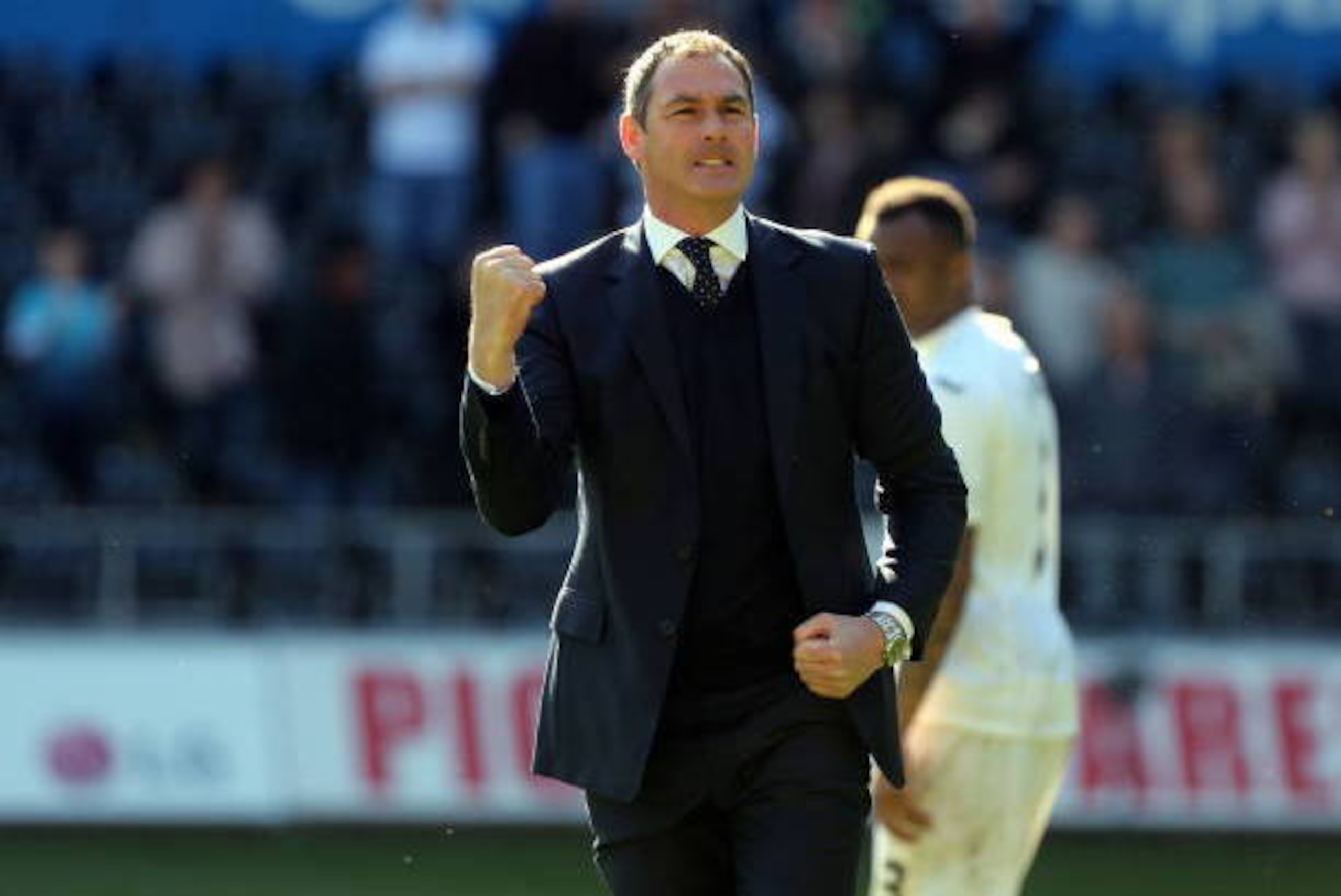 SWANSEA, WALES - APRIL 22: Manager of Swansea City, Paul Clement celebrates his team's win after the Premier League match between Swansea City and Stoke City at The Liberty Stadium on April 22, 2017 in Swansea, Wales. (Photo by Athena Pictures/Getty Image