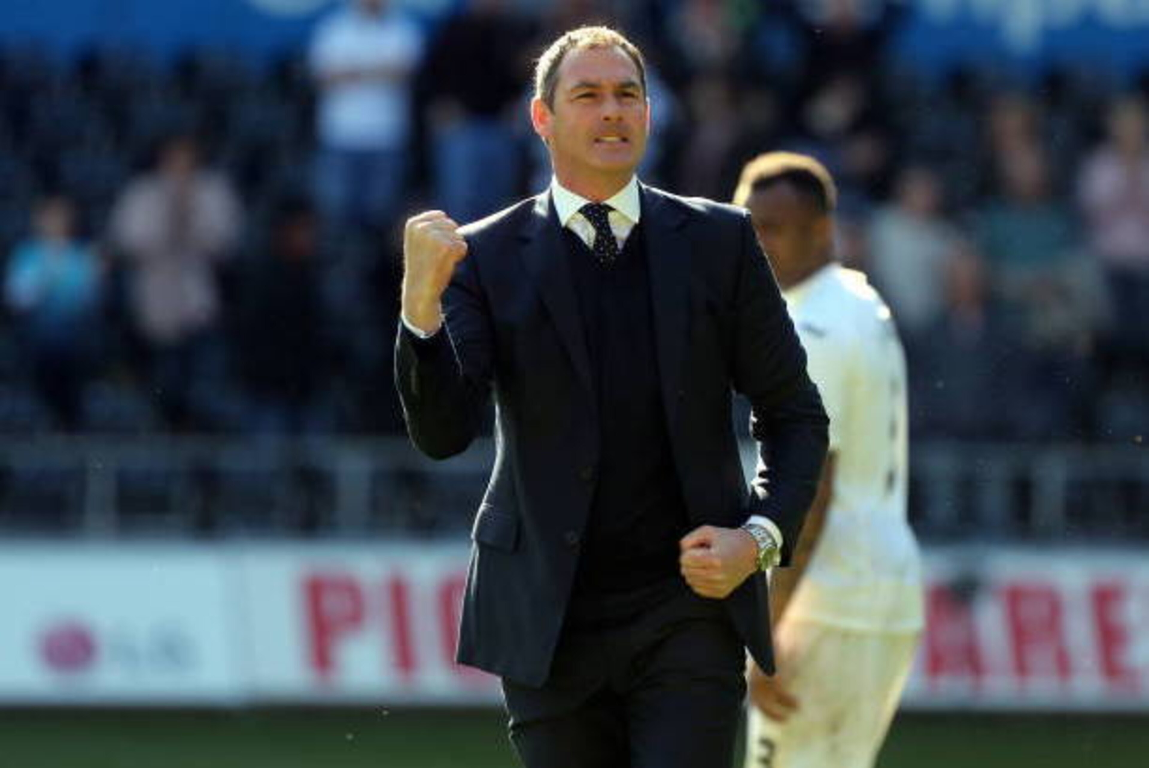 SWANSEA, WALES - APRIL 22: Manager of Swansea City, Paul Clement celebrates his team's win after the Premier League match between Swansea City and Stoke City at The Liberty Stadium on April 22, 2017 in Swansea, Wales. (Photo by Athena Pictures/Getty Image