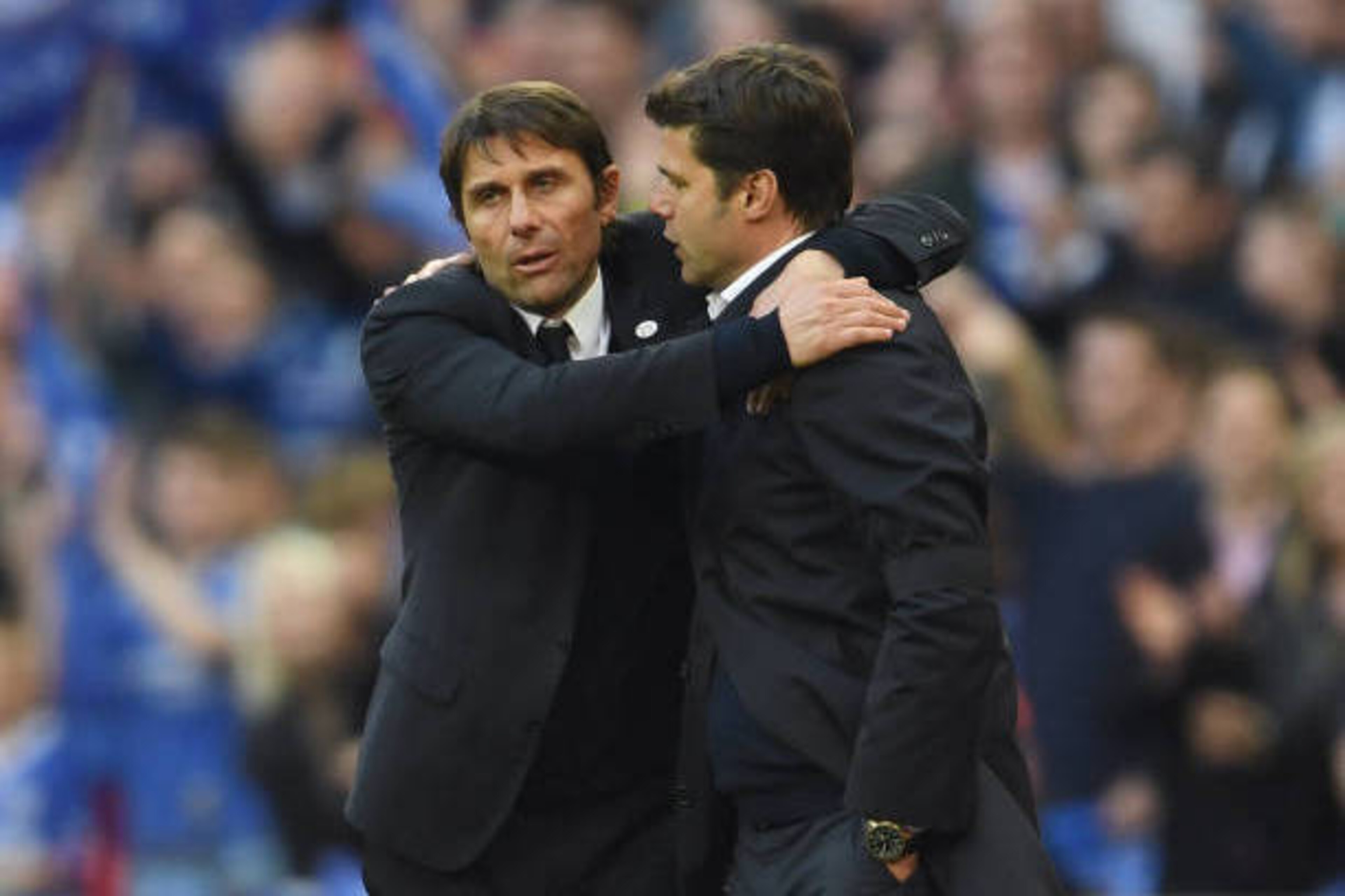 LONDON, ENGLAND - APRIL 22:  Antonio Conte, Manager of Chelsea and Mauricio Pochettino, Manager of Tottenham Hotspur shake hands after the full time whistle during The Emirates FA Cup Semi-Final between Chelsea and Tottenham Hotspur at Wembley Stadium on 