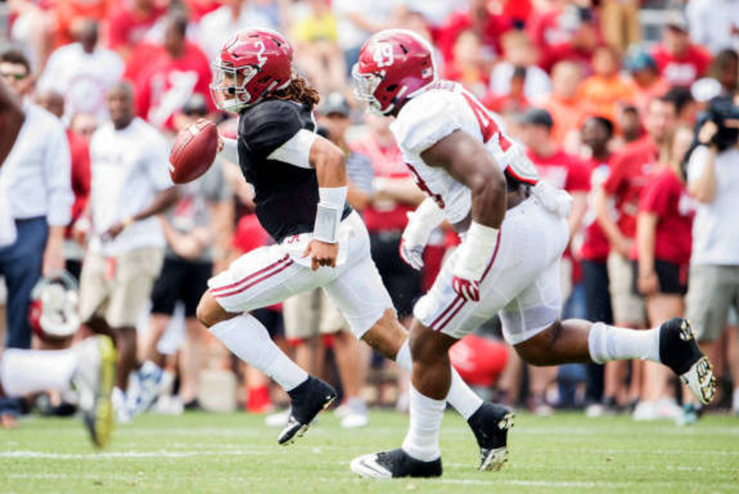 TUSCALOOSA, AL - APRIL 22: Quarterback Jalen Hurts #2 of the Alabama Crimson Tide scrambles the ball by defensive lineman Isaiah Buggs #49 of the Alabama Crimson Tide at Bryant-Denny Stadium on April 22, 2017 in Tuscaloosa, Alabama. (Photo by Michael Chan