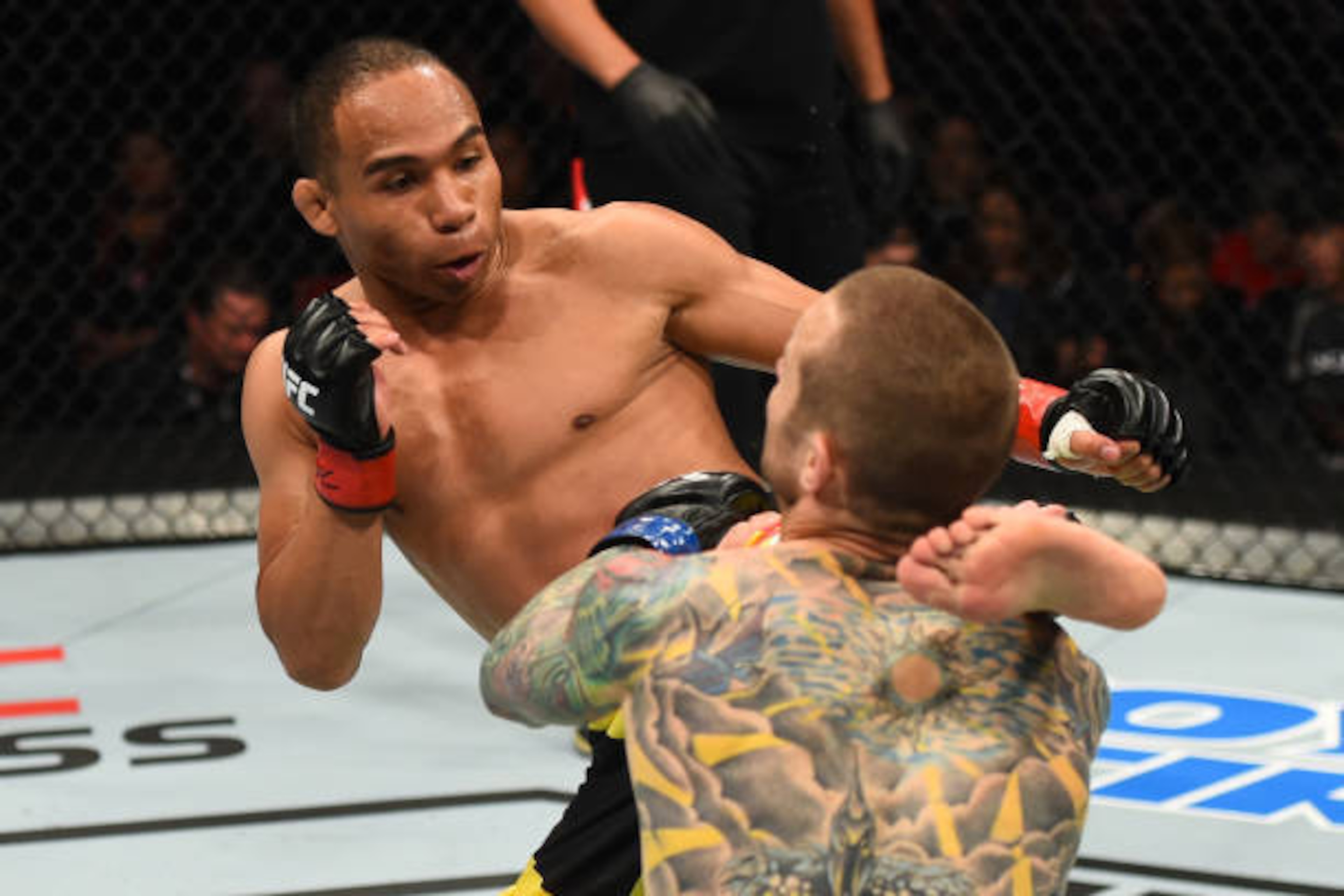 NASHVILLE, TN - APRIL 22:  (L-R) John Dodson kicks Eddie Wineland in their bantamweight bout during the UFC Fight Night event at Bridgestone Arena on April 22, 2017 in Nashville, Tennessee. (Photo by Jeff Bottari/Zuffa LLC/Zuffa LLC via Getty Images)