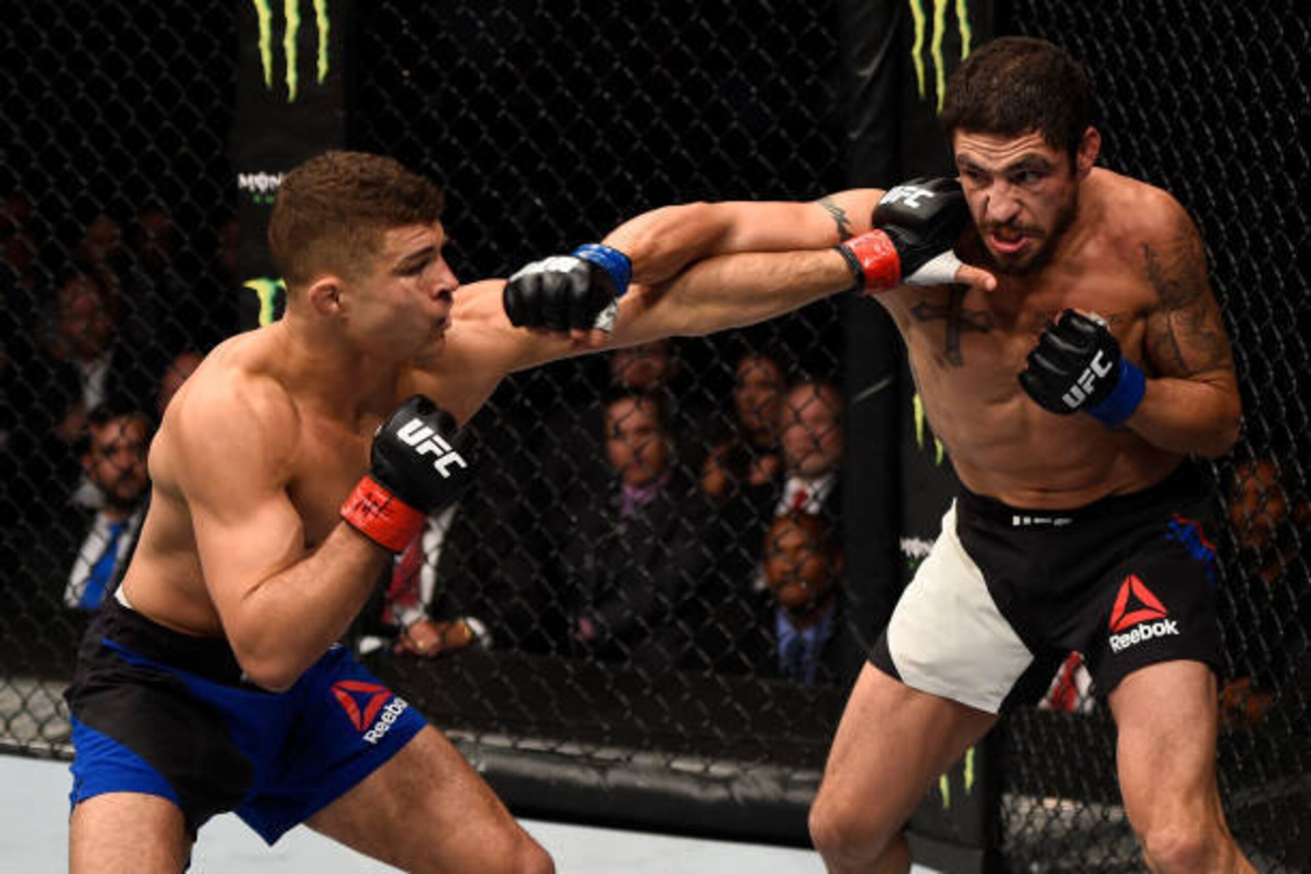 NASHVILLE, TN - APRIL 22:  (R-L) Diego Sanchez punches Al Iaquinta in their lightweight bout during the UFC Fight Night event at Bridgestone Arena on April 22, 2017 in Nashville, Tennessee. (Photo by Jeff Bottari/Zuffa LLC/Zuffa LLC via Getty Images)