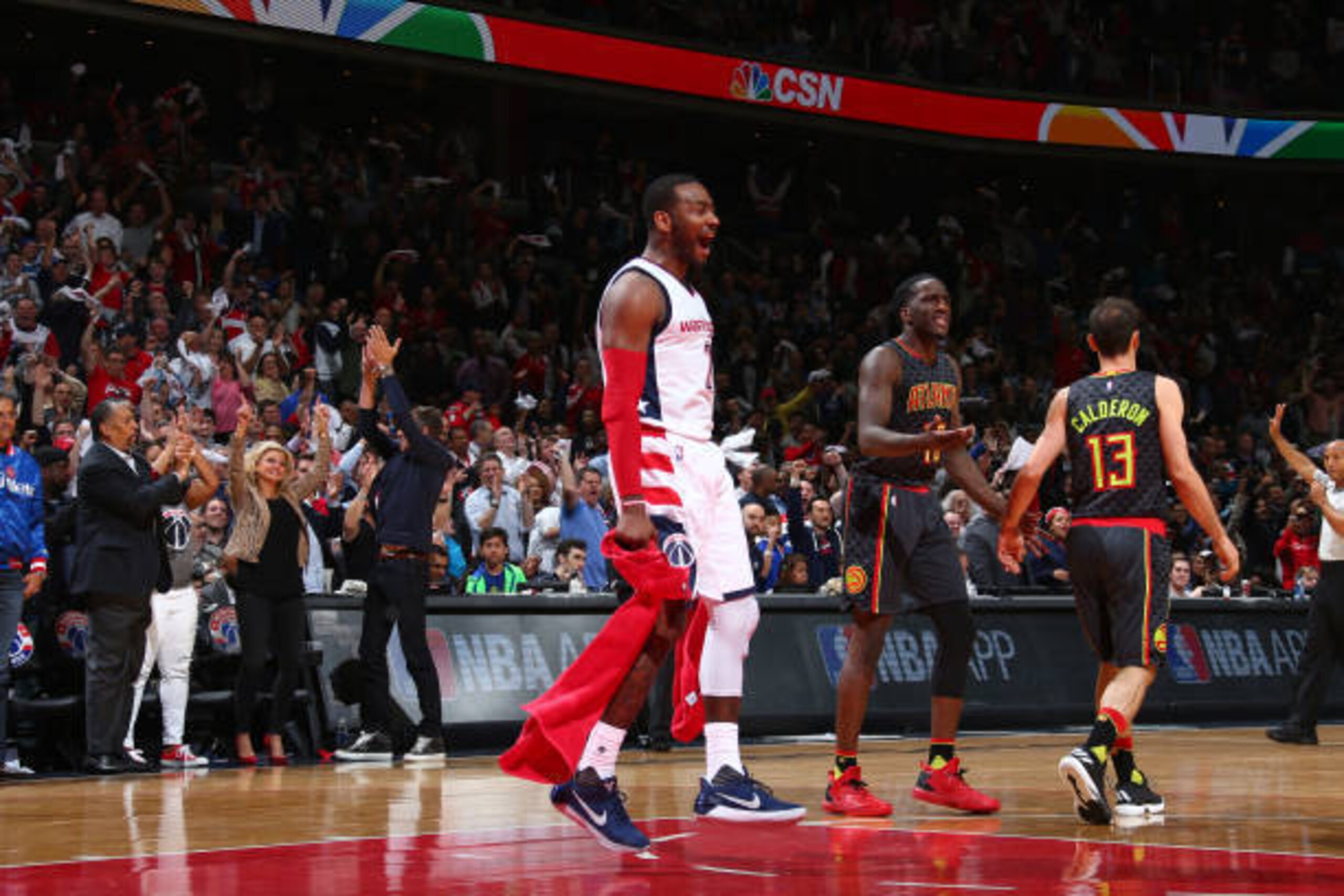 WASHINGTON, DC -  APRIL 19: John Wall #2 of the Washington Wizards celebrates against the Atlanta Hawks during Game Two of the Eastern Conference Quarterfinals of the 2017 NBA Playoffs on April 19, 2016 at Verizon Center in Washington, DC. NOTE TO USER: U