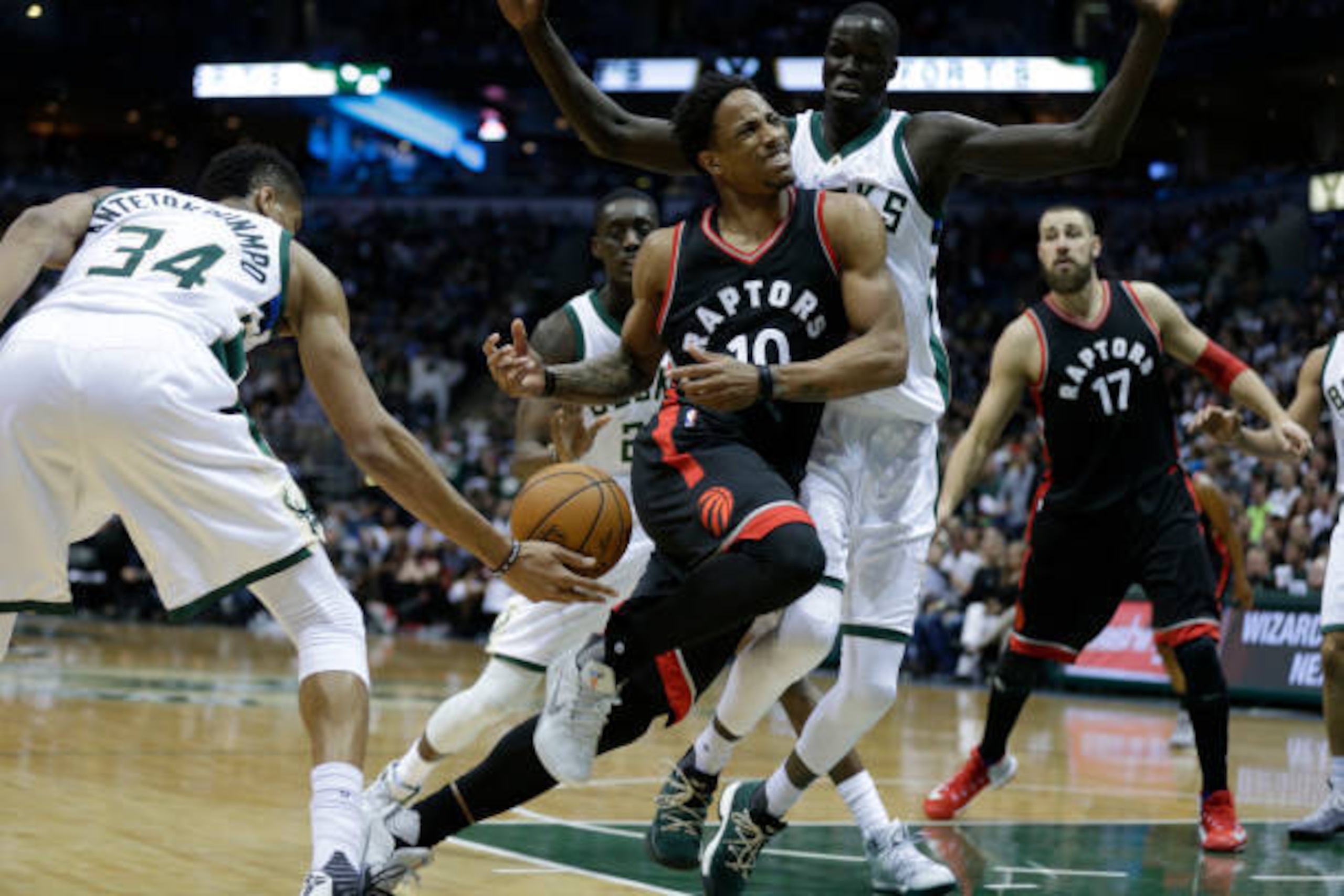 MILWAUKEE, WI - APRIL 22: DeMar DeRozan #10 of the Toronto Raptors gets4 stripped of the basketball by Giannis Antetokounmpo #34 of the Milwaukee Bucks during the second half of Game Four of the Eastern Conference Quarterfinals during the 2017 NBA Playoff