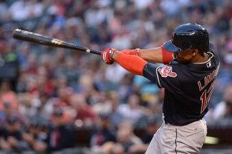 PHOENIX, AZ - APRIL 07:  Francisco Lindor #12 of the Cleveland Indians hits a solo homer in the first inning of the MLB game against the Arizona Diamondbacks at Chase Field on April 7, 2017 in Phoenix, Arizona.  (Photo by Jennifer Stewart/Getty Images)
