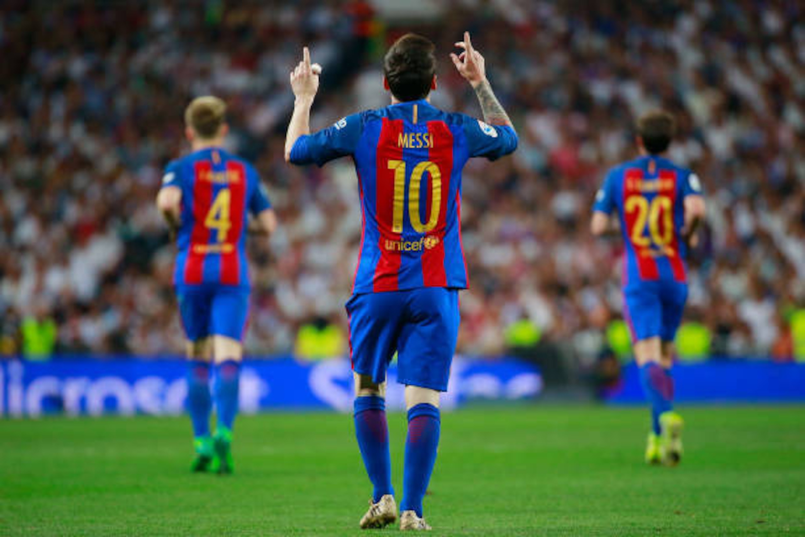 MADRID, SPAIN - APRIL 23:  Lionel Messi of Barcelona (10) celebrates as he scores their first and equalising goal with team mates during the La Liga match between Real Madrid CF and FC Barcelona at Estadio Bernabeu on April 23, 2017 in Madrid, Spain.  (Ph