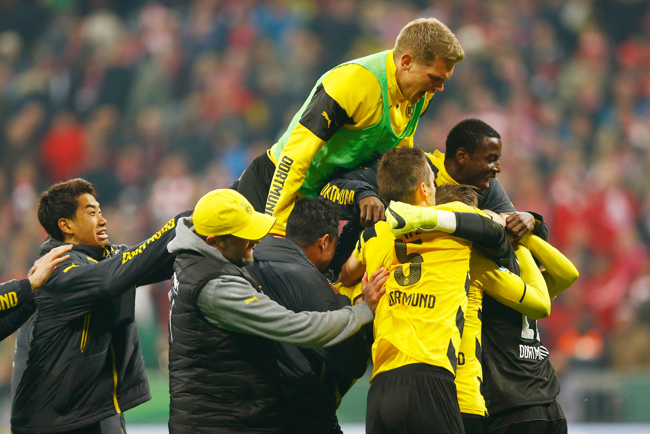 Dortmund's players celebrate at the Allianz after their shootout win in the 2015 semi-final