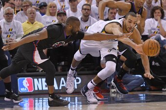 Raymond Felton and Rudy Gobert go for the loose ball during Game 4 on April 23, 2017. The Jazz and Clippers go into Game 5 with the series tied 2-2.