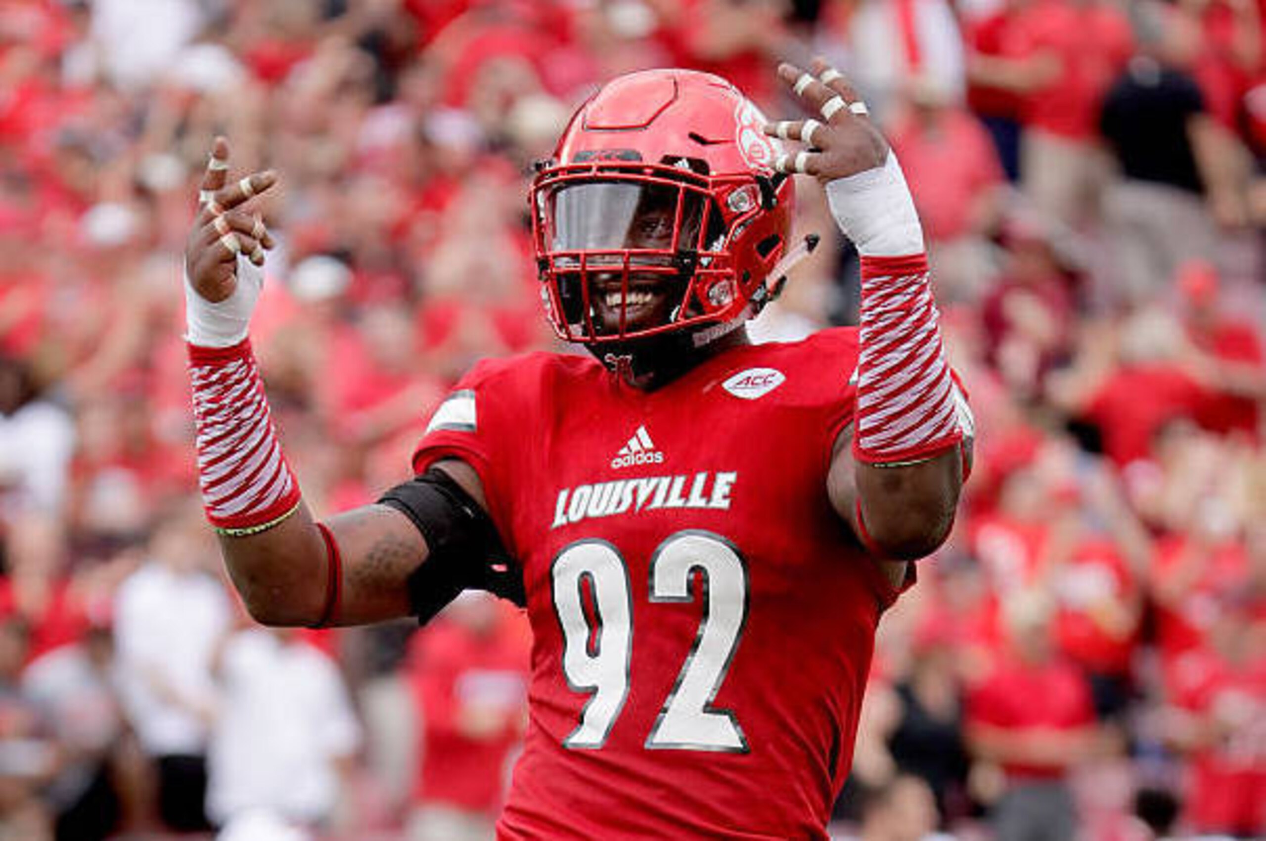 LOUISVILLE, KY - SEPTEMBER 17:  Devonte Fields #92 of the Louisville Cardinals celebrates a sack against the Florida State Seminoles  at Papa John's Cardinal Stadium on September 17, 2016 in Louisville, Kentucky.  (Photo by Andy Lyons/Getty Images)