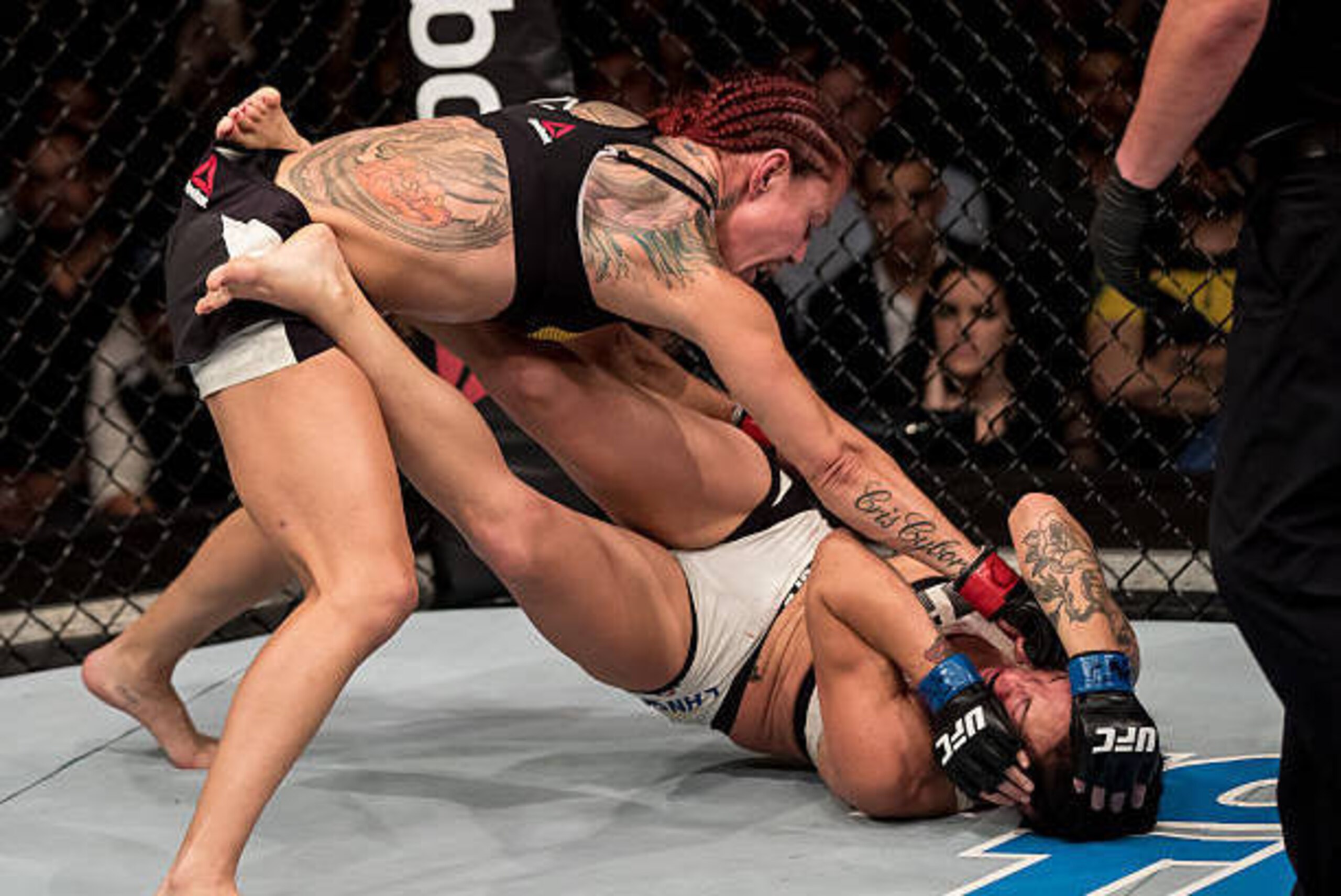 BRASILIA, BRAZIL - SEPTEMBER 24: Cris Cyborg of Brazil submits Lina Lansberg of Sweden in their catchweight bout during the UFC Fight Night event at Nilson Nelson gymnasium on September 24, 2016 in Brasilia, Brazil. (Photo by Buda Mendes/Zuffa LLC/Zuffa L