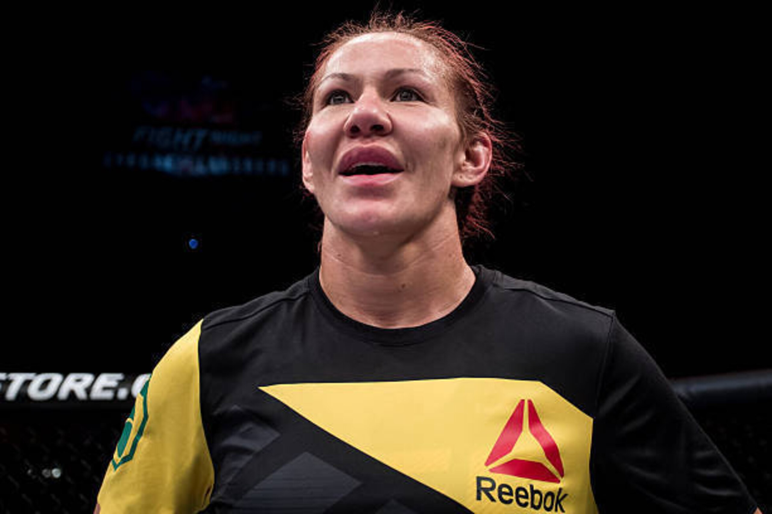 BRASILIA, BRAZIL - SEPTEMBER 24: Cris Cyborg of Brazil celebrates victory over Lina Lansberg of Sweden in their catchweight UFC bout during the UFC Fight Night event at Nilson Nelson gymnasium on September 24, 2016 in Brasilia, Brazil. (Photo by Buda Mend