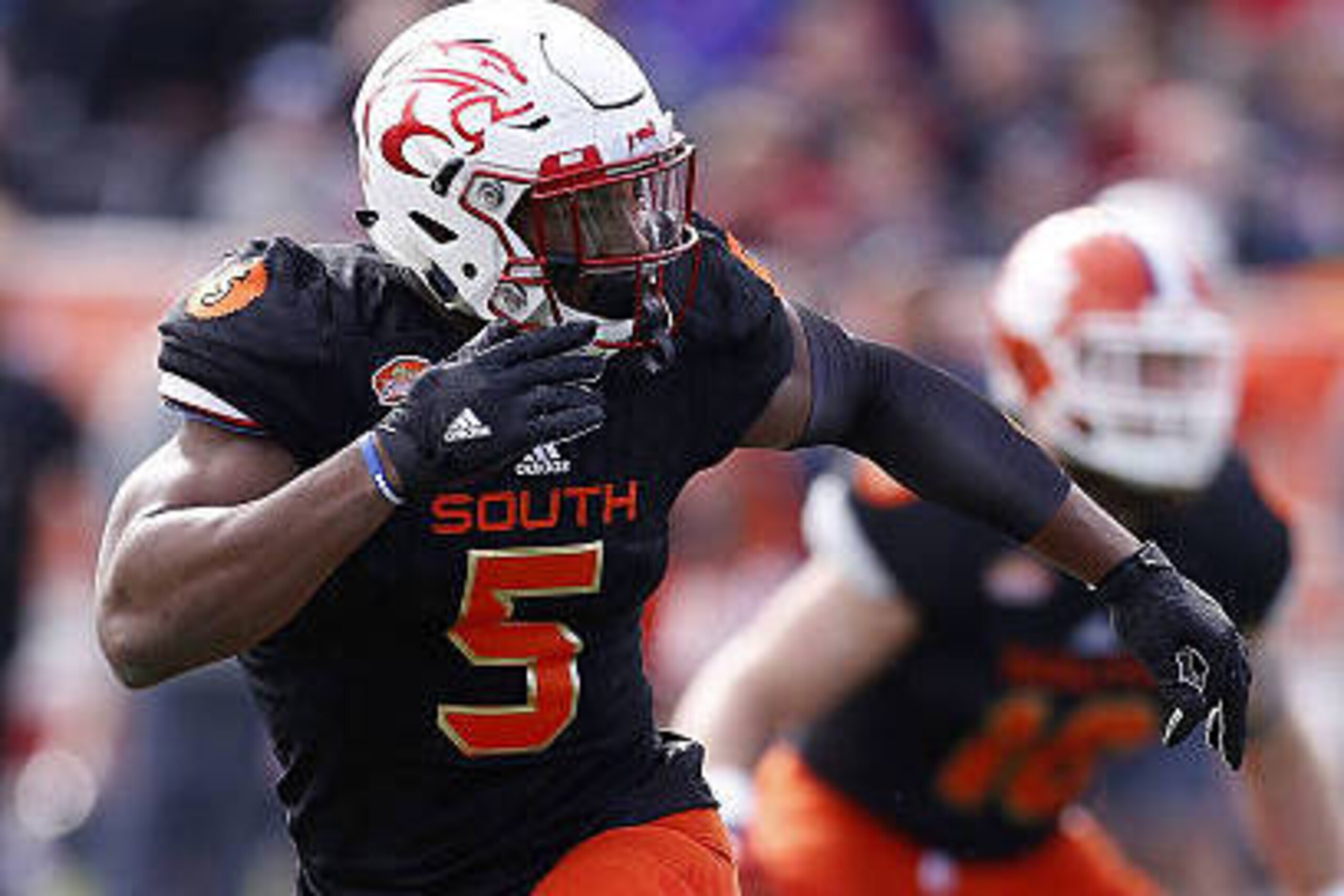 MOBILE, AL - JANUARY 28:  Tyus Bowser #5 of the South team  of the North team defends during the Reese's Senior Bowl at the Ladd-Peebles Stadium on January 28, 2017 in Mobile, Alabama.  (Photo by Jonathan Bachman/Getty Images)