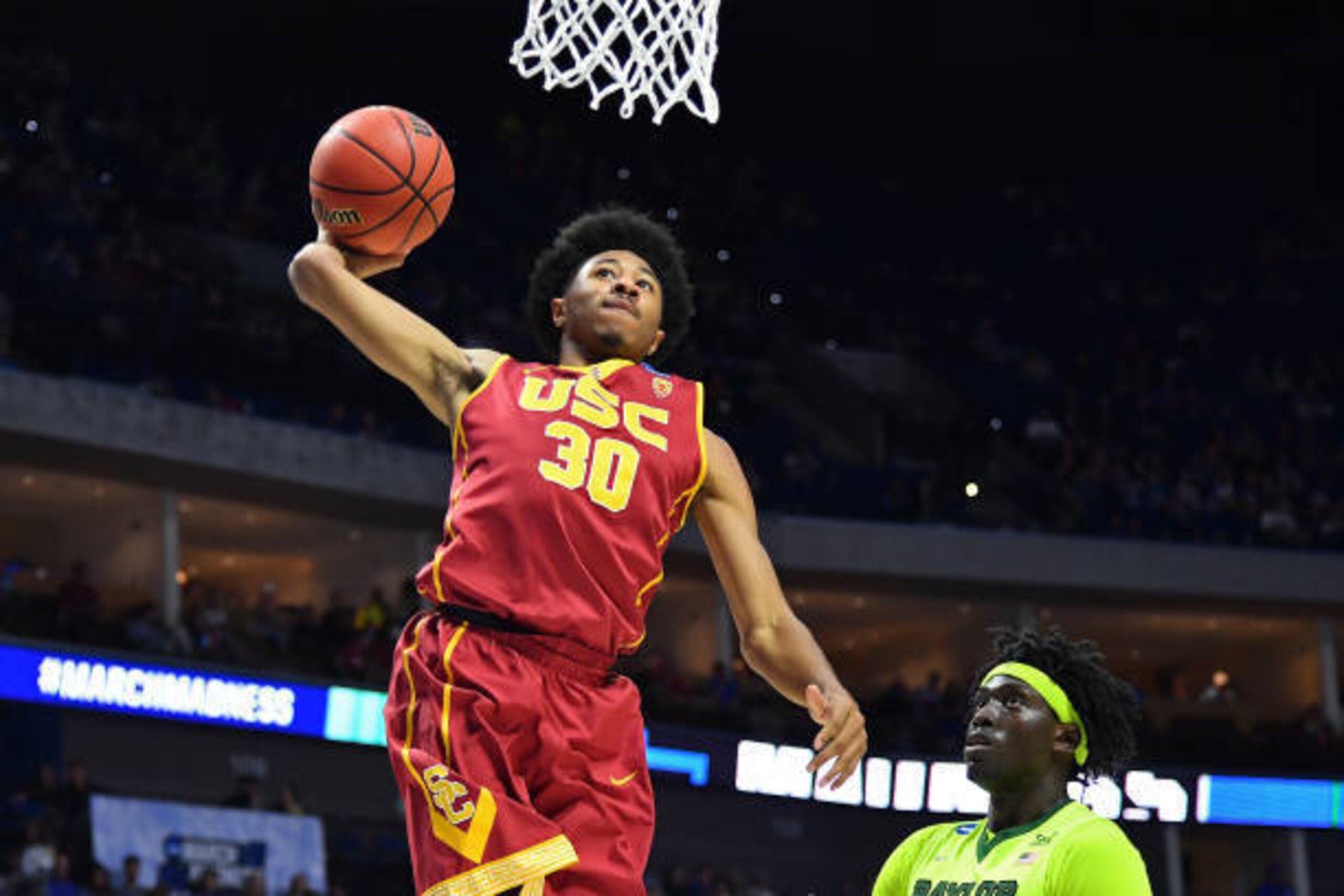 TULSA, OK - MARCH 19: Elijah Stewart #30 of the USC Trojans dunks the ball against the Baylor Bears during the second round of the 2017 NCAA Men's Basketball Tournament at BOK Center on March 19, 2017 in Tulsa, Oklahoma. (Photo by J Pat Carter/Getty Imag TULSA, OK - MARCH 19: Elijah Stewart #30 of the USC Trojans dunks the ball against the Baylor Bears during the second round of the 2017 NCAA Men's Basketball Tournament at BOK Center on March 19, 2017 in Tulsa, Oklahoma. (Photo by J Pat Carter/Getty Imag