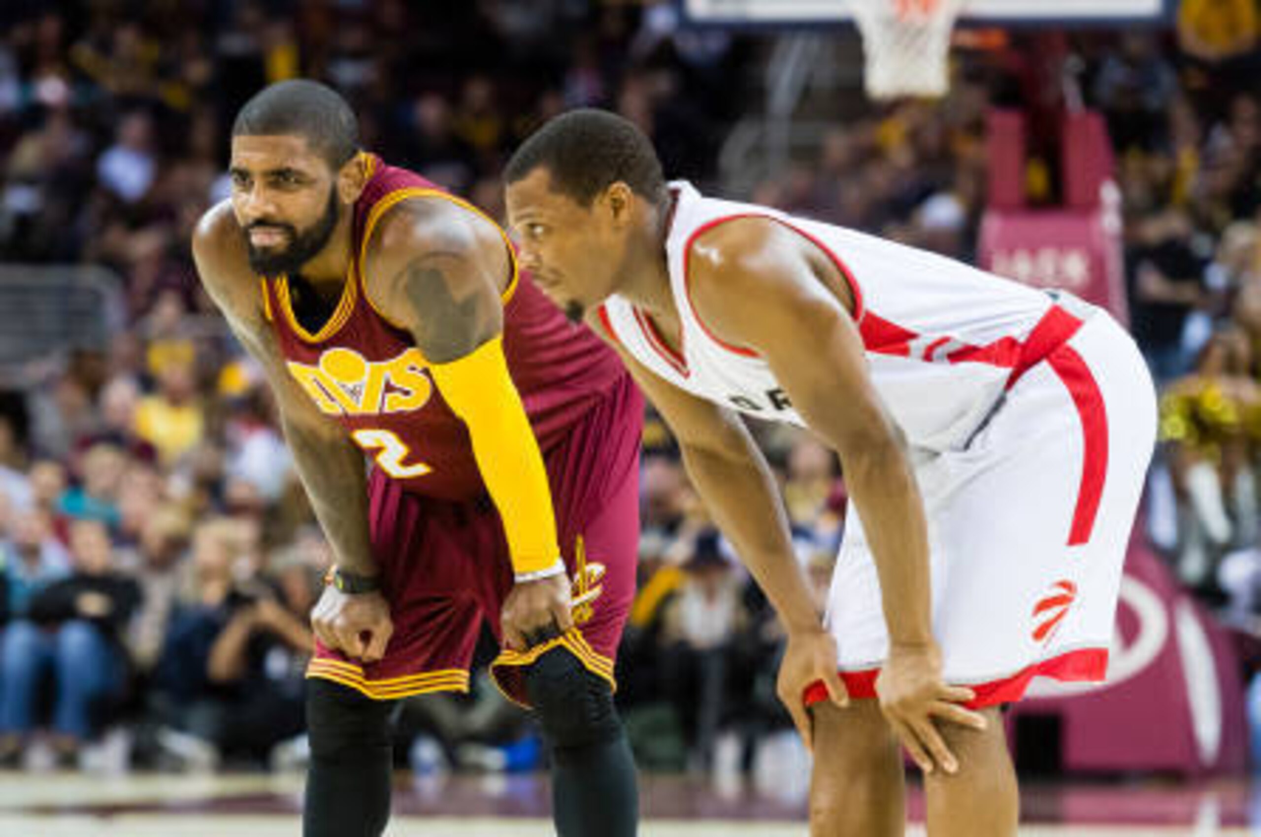CLEVELAND, OH - NOVEMBER 15: Kyrie Irving #2 of the Cleveland Cavaliers and Kyle Lowry #7 of the Toronto Raptors pause on the court during the second half at Quicken Loans Arena on November 15, 2016 in Cleveland, Ohio. The Cavaliers defeated the Raptors 1