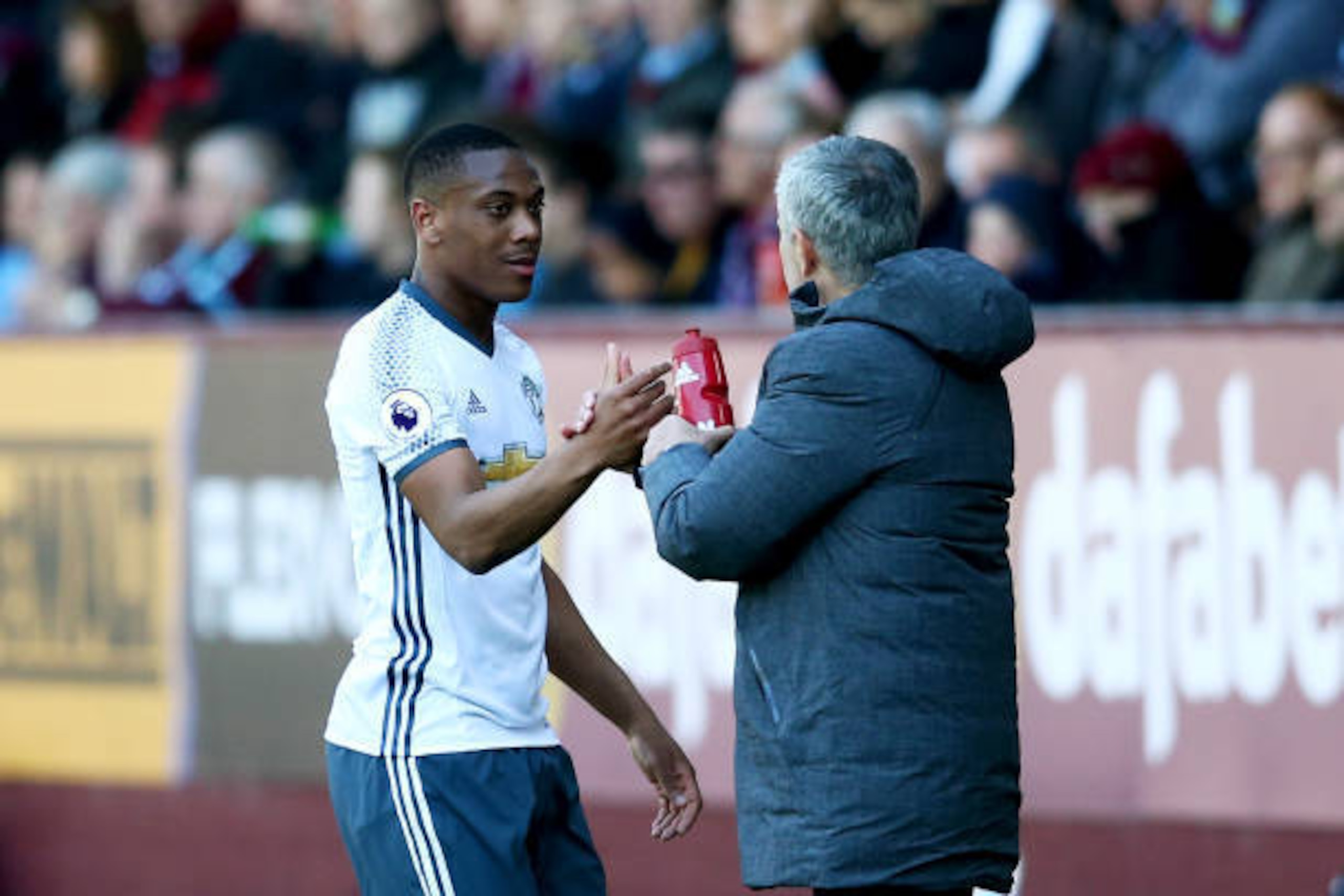 BURNLEY, ENGLAND - APRIL 23:  Jose Mourinho, manager of Manchester United shakes hands with Anthony Martial of Manchester United as he is substituted during the Premier League match between Burnley and Manchester United at Turf Moor on April 23, 2017 in B