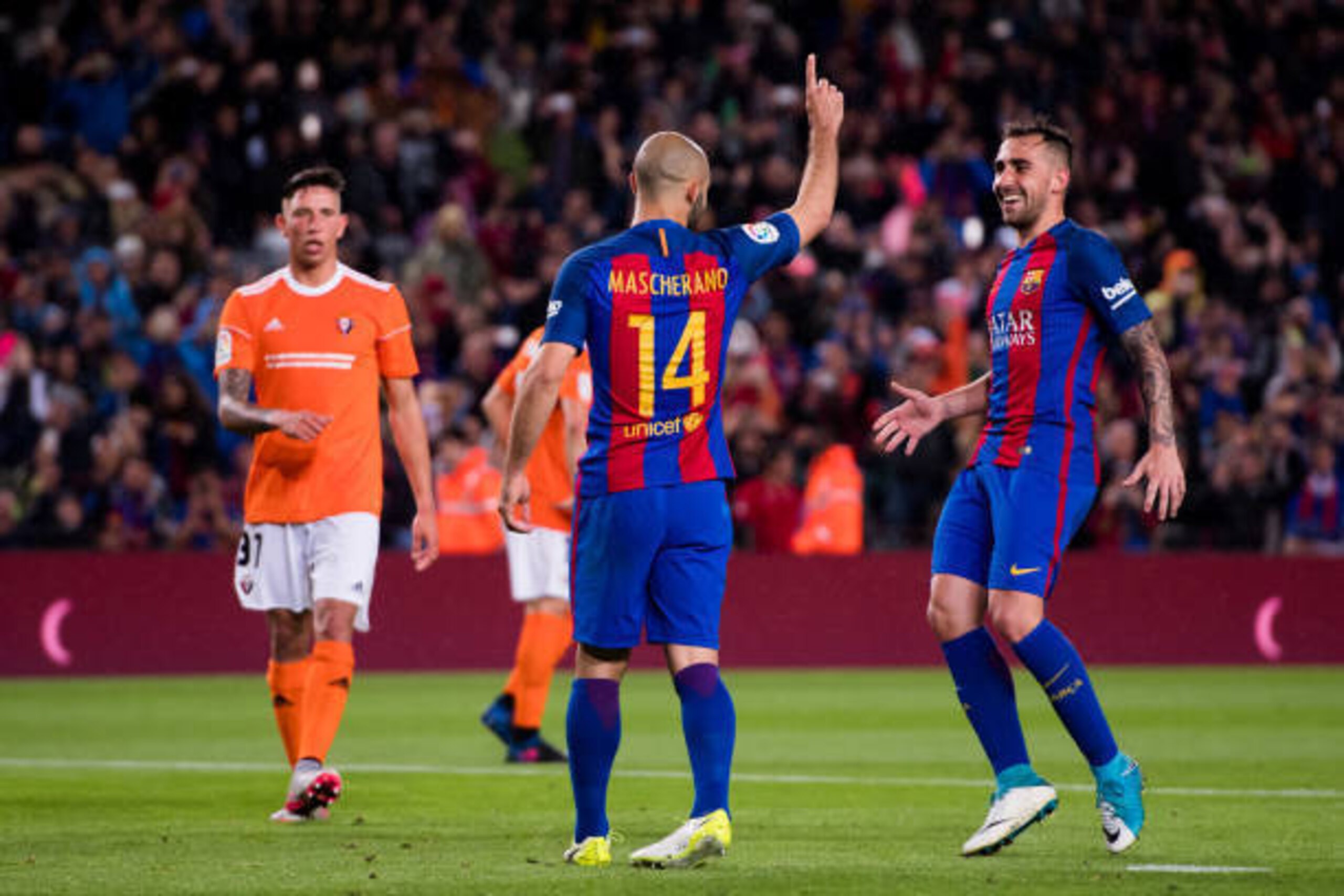BARCELONA, SPAIN - APRIL 26: Javier Mascherano of FC Barcelona celebrates with his teammate Paco Alcacer after scoring his team's sisth goal during the La Liga match between FC Barcelona and CA Osasuna at Camp Nou stadium on April 26, 2017 in Barcelona, S