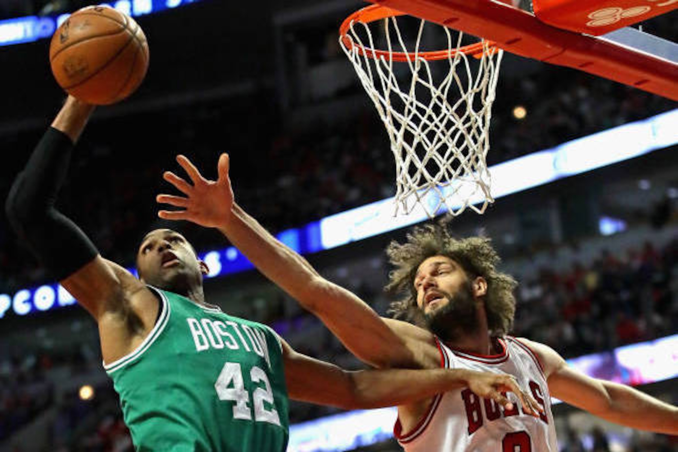CHICAGO, IL - APRIL 23: Al Horford #42 of the Boston Celtics grabs a rebound over Robin Lopez #8 of the Chicago Bulls during Game Four of the Eastern Conference Quarterfinals during the 2017 NBA Playoffs at the United Center on April 23, 2017 in Chicag CHICAGO, IL - APRIL 23: Al Horford #42 of the Boston Celtics grabs a rebound over Robin Lopez #8 of the Chicago Bulls during Game Four of the Eastern Conference Quarterfinals during the 2017 NBA Playoffs at the United Center on April 23, 2017 in Chicag