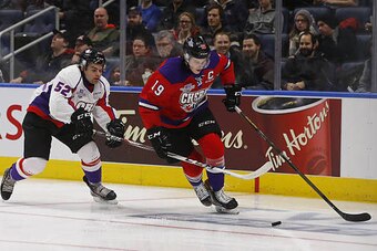 QUEBEC CITY, QC - JANUARY 30:   Nolan Patrick #19 of Team Cherry and Markus Phillips #52 Team Orr battle for the puck during the first period of their Sherwin-Williams CHL/NHL Top Prospects Game at the Videotron Center on January 30, 2017 in Quebec City, 