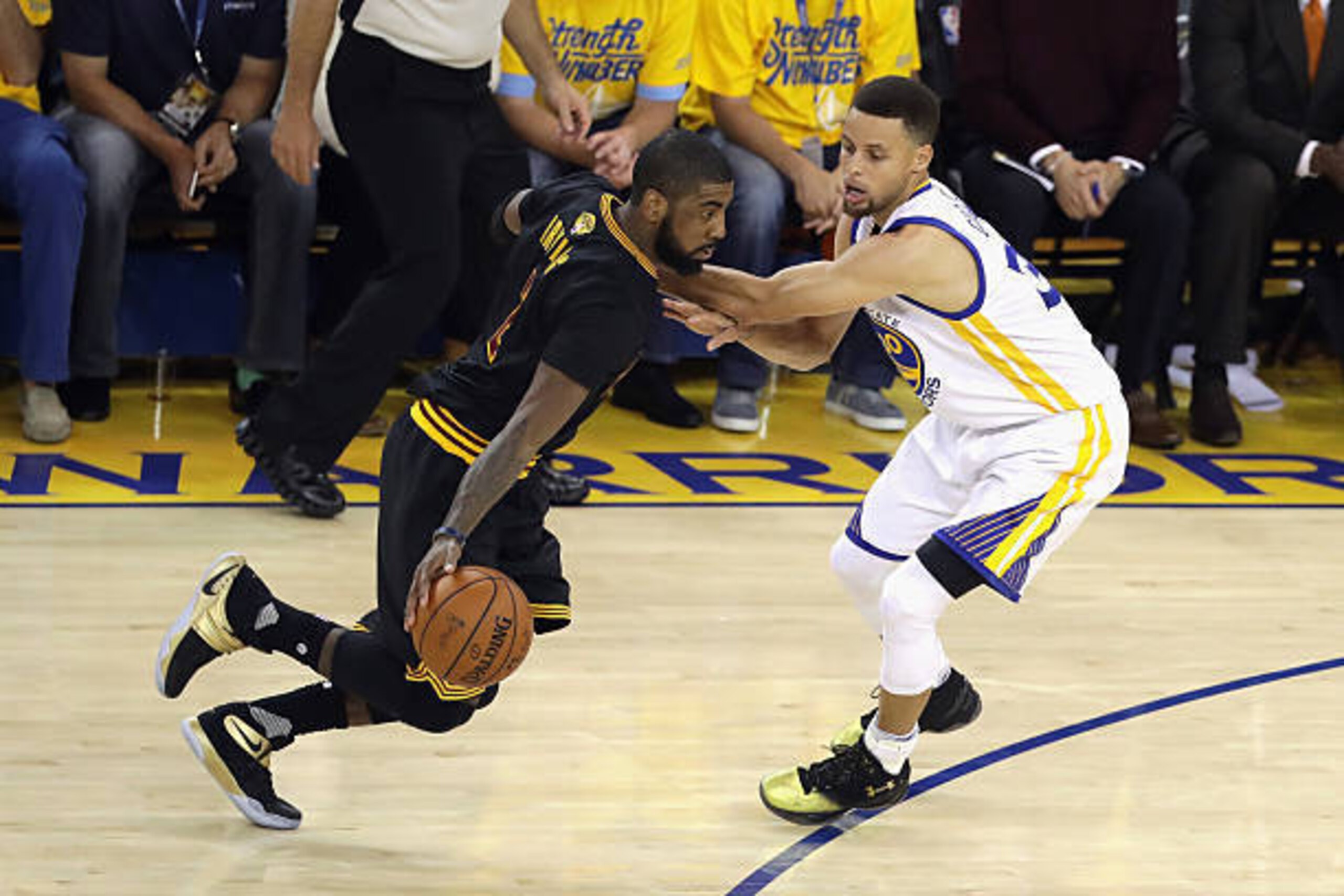 OAKLAND, CA - JUNE 19: Kyrie Irving #2 of the Cleveland Cavaliers drives against Stephen Curry #30 of the Golden State Warriors during the first half in Game 7 of the 2016 NBA Finals at ORACLE Arena on June 19, 2016 in Oakland, California. NOTE TO USER: OAKLAND, CA - JUNE 19: Kyrie Irving #2 of the Cleveland Cavaliers drives against Stephen Curry #30 of the Golden State Warriors during the first half in Game 7 of the 2016 NBA Finals at ORACLE Arena on June 19, 2016 in Oakland, California. NOTE TO USER: