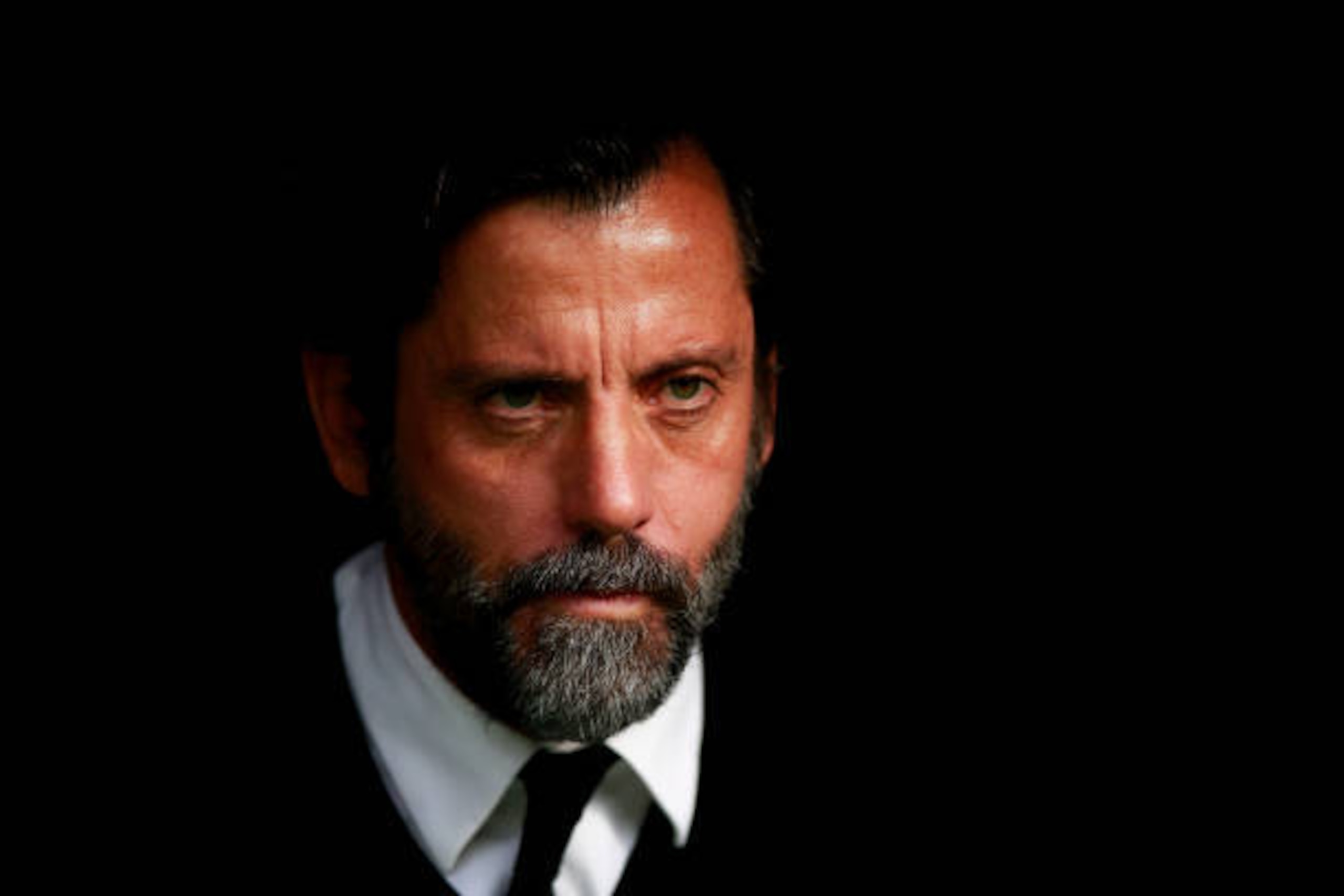MADRID, SPAIN - FEBRUARY 18:  Head Enrique Sanchez Flores of RCD Espanyol looks on from the benches prior to start the La Liga match between Real Madrid CF and RCD Espanyol at Estadio Santiago Bernabeu on February 18, 2017 in Madrid, Spain.  (Photo by Gon
