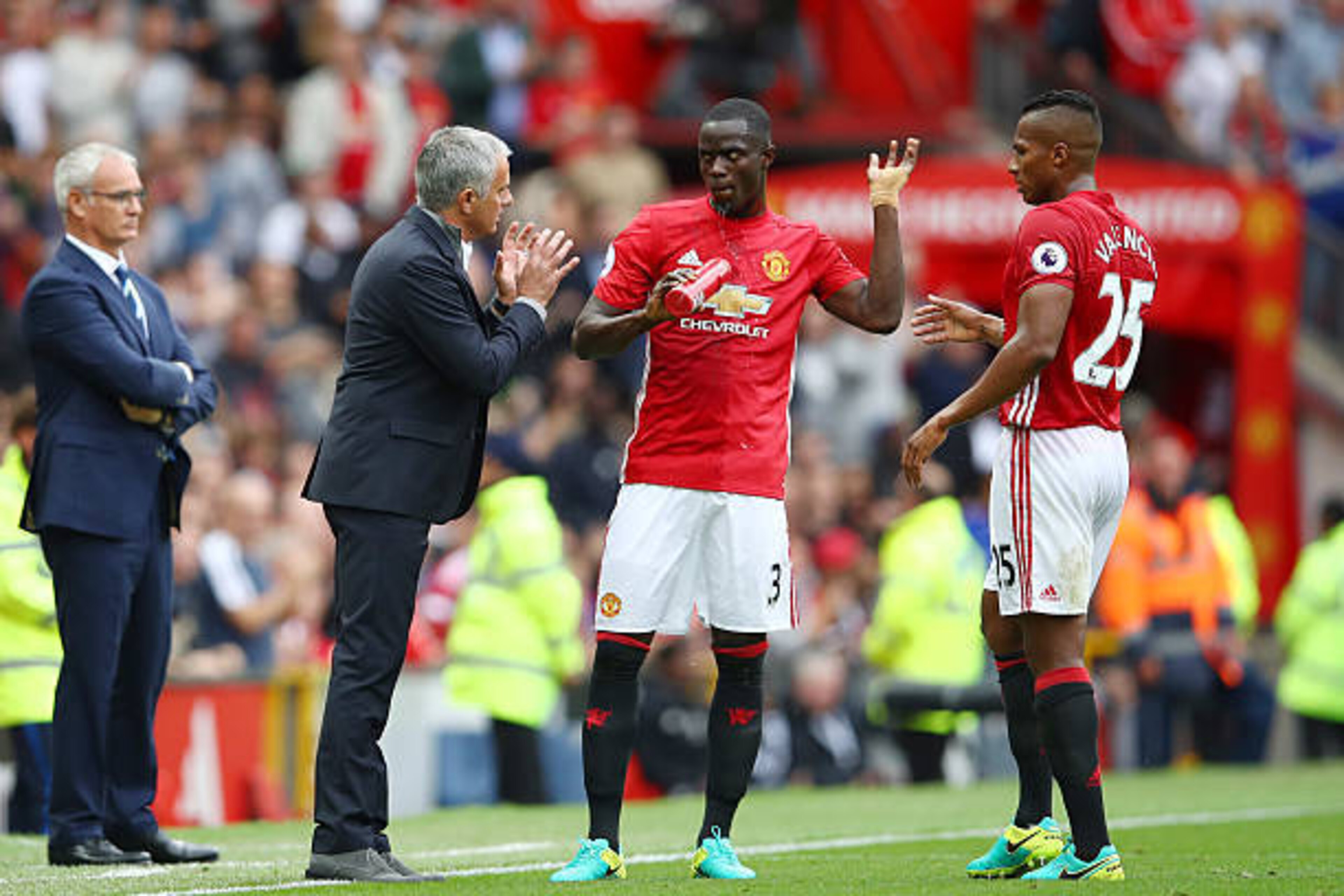MANCHESTER, ENGLAND - SEPTEMBER 24: Jose Mourinho, Manager of Manchester United gives Eric Bailly of Manchester United and Antonio Valencia of Manchester United instructions during the Premier League match between Manchester United and Leicester City at O
