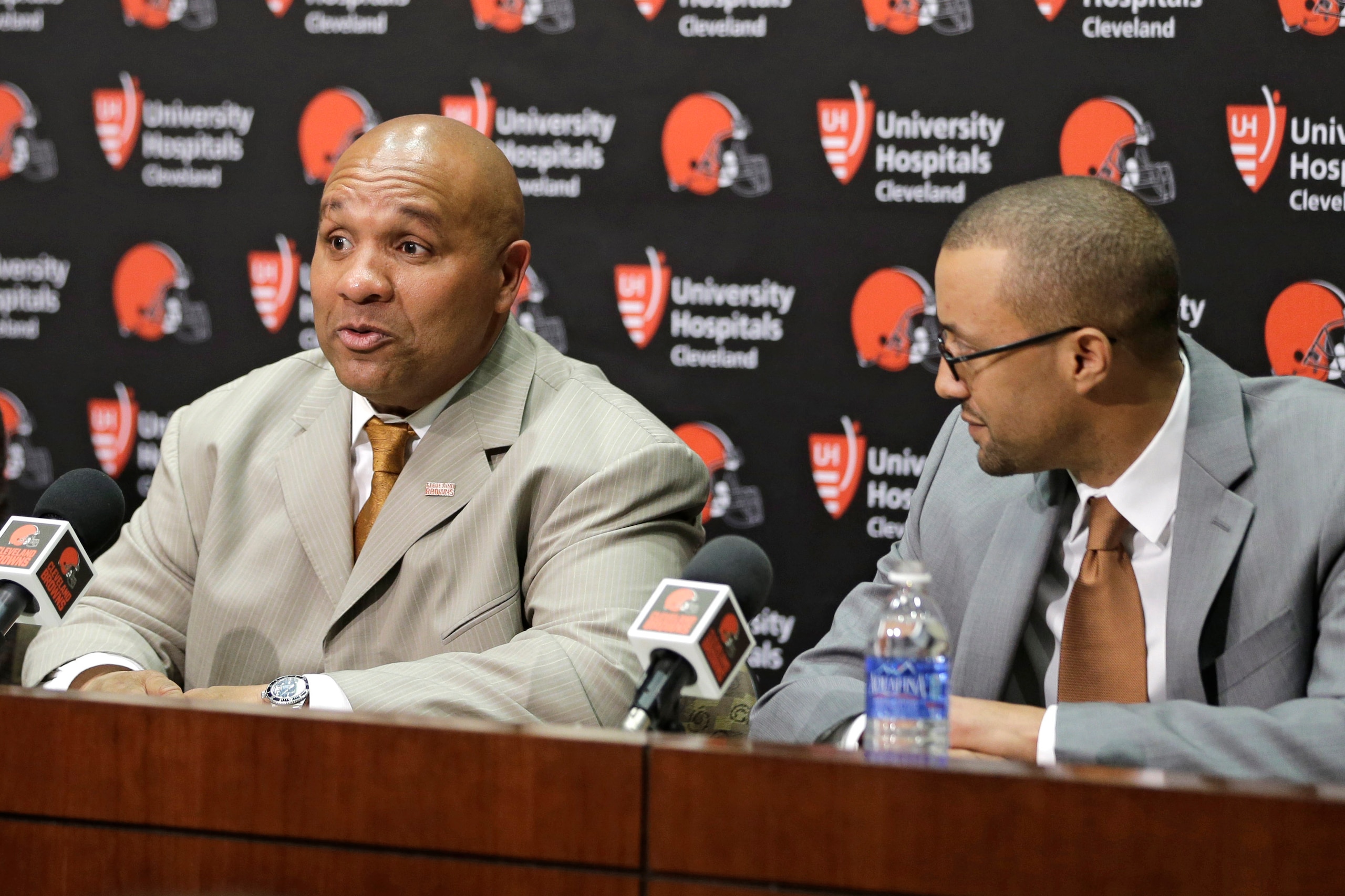 Cleveland Browns head coach Hue Jackson (left) and executive vice president of player personnel Sashi Brown (right)