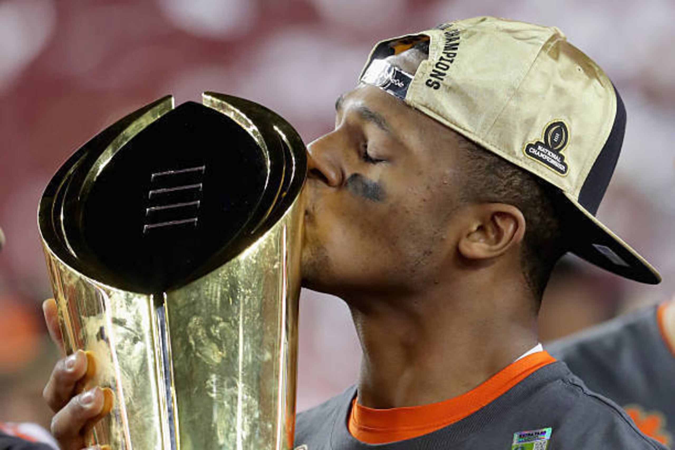 TAMPA, FL - JANUARY 09:  Deshaun Watson #4 of the Clemson Tigers celebrates with the trophy after defeating the Alabama Crimson Tide to win the 2017 College Football Playoff National Championship Game 35-31 at Raymond James Stadium on January 9, 2017 in T