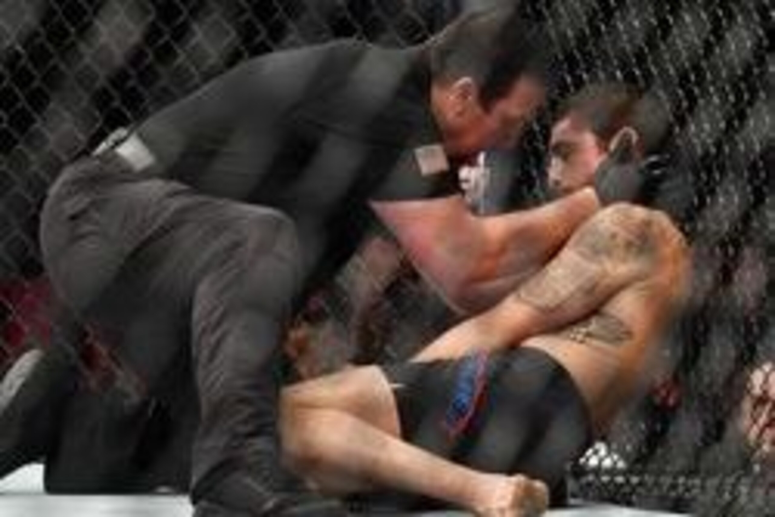 Apr 22, 2017; Nashville, TN, USA;  Diego Sanchez (blue gloves) after losing to Al Iaquinta during UFC Fight Night at Bridgestone Arena. Mandatory Credit: Christopher Hanewinckel-USA TODAY Sports
