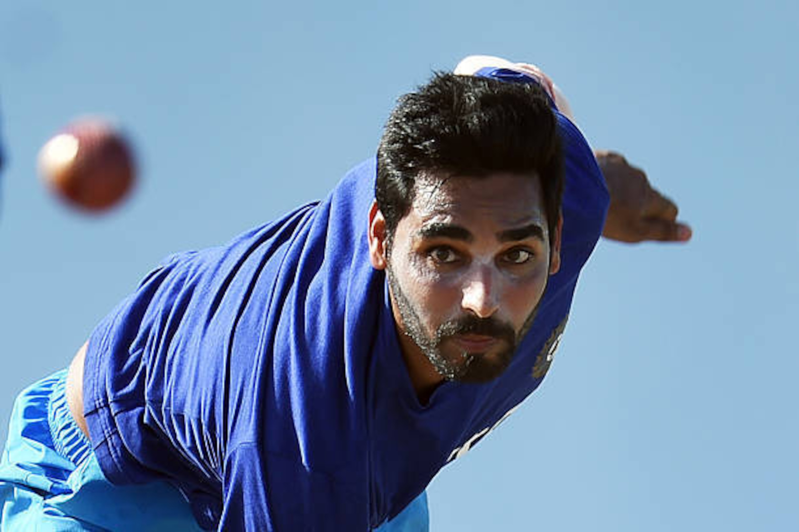 Indian cricketer Bhuvneshwar Kumar delivers a ball while practicing at the end of the three-day tour match between India and WICB President's XI squad at the Warner Park stadium in Basseterre, Saint Kitts, on July 16, 2016. / AFP / Jewel SAMAD        (Pho