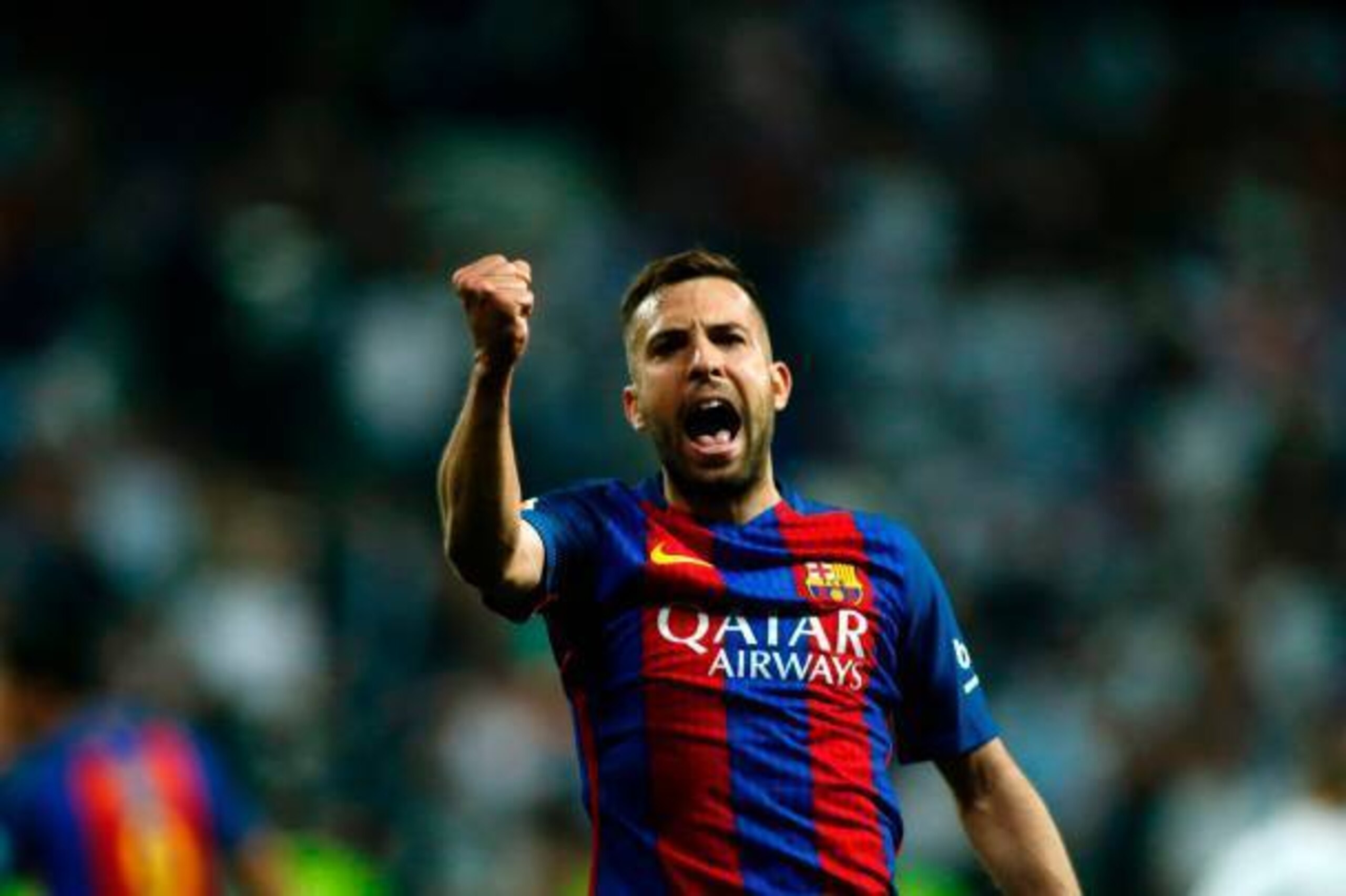 Barcelona's defender Jordi Alba gestures during the Spanish league Clasico football match Real Madrid CF vs FC Barcelona at the Santiago Bernabeu stadium in Madrid on April 23, 2017. / AFP PHOTO / OSCAR DEL POZO        (Photo credit should read OSCAR DEL 