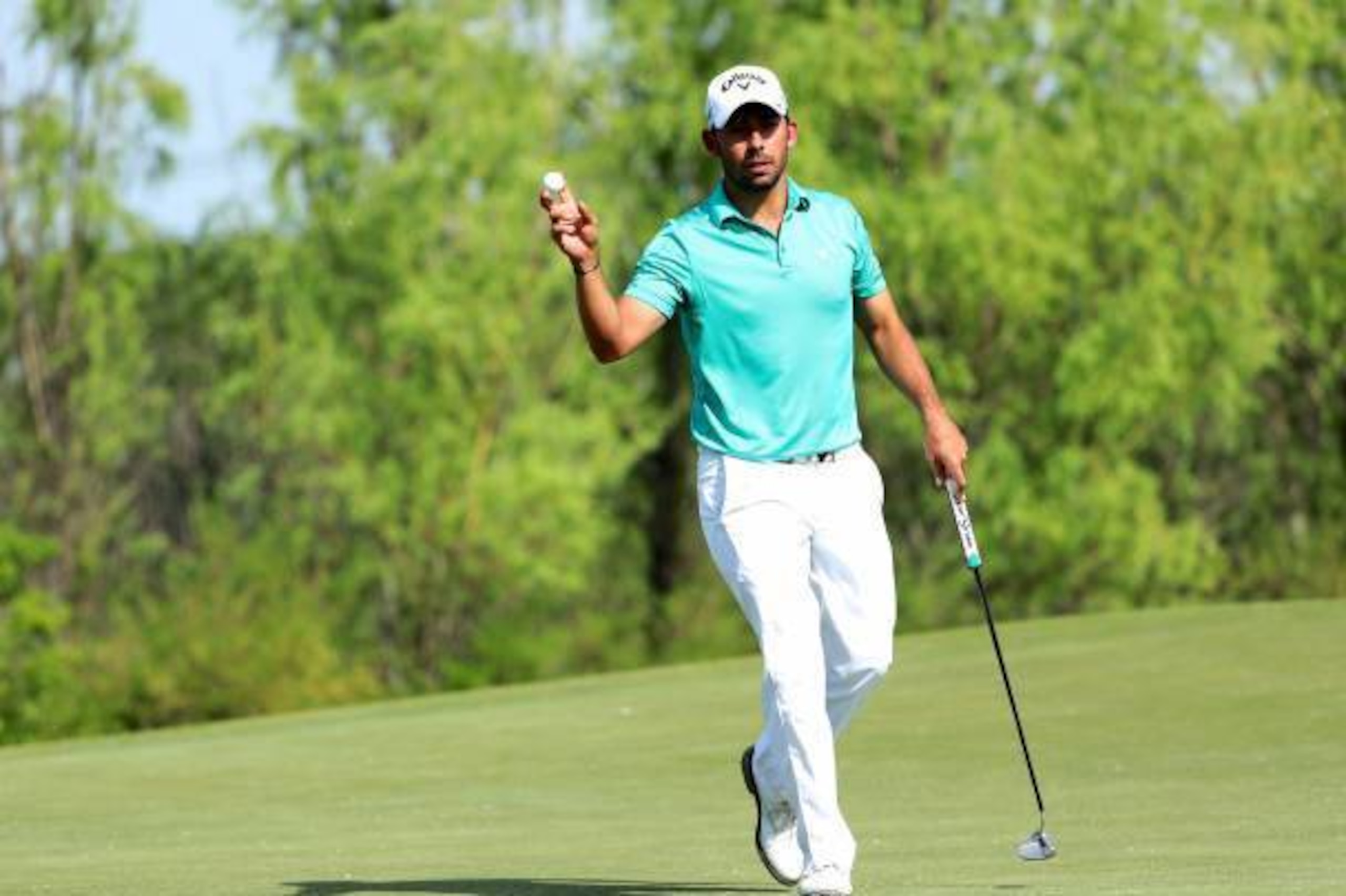 Pablo Larrazabal of Spain reacts after a putt during the second round of the Volvo China Open golf tournament in Beijing on April 28, 2017. / AFP PHOTO / STR / CHINA OUT        (Photo credit should read STR/AFP/Getty Images)