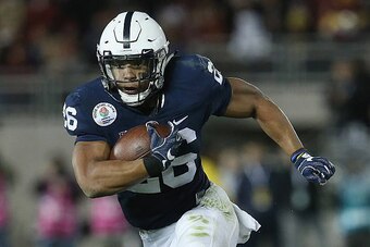 PASADENA, CA - JANUARY 02:  Running back Saquon Barkley #26 of the Penn State Nittany Lions runs with the ball against the USC Trojans during the 2017 Rose Bowl Game presented by Northwestern Mutual at the Rose Bowl on January 2, 2017 in Pasadena, Califor