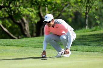 Dylan Frittelli of South Africa reacts during the third round of the China Open golf tournament in Beijing on April 29, 2017. / AFP PHOTO / STR / China OUT        (Photo credit should read STR/AFP/Getty Images)