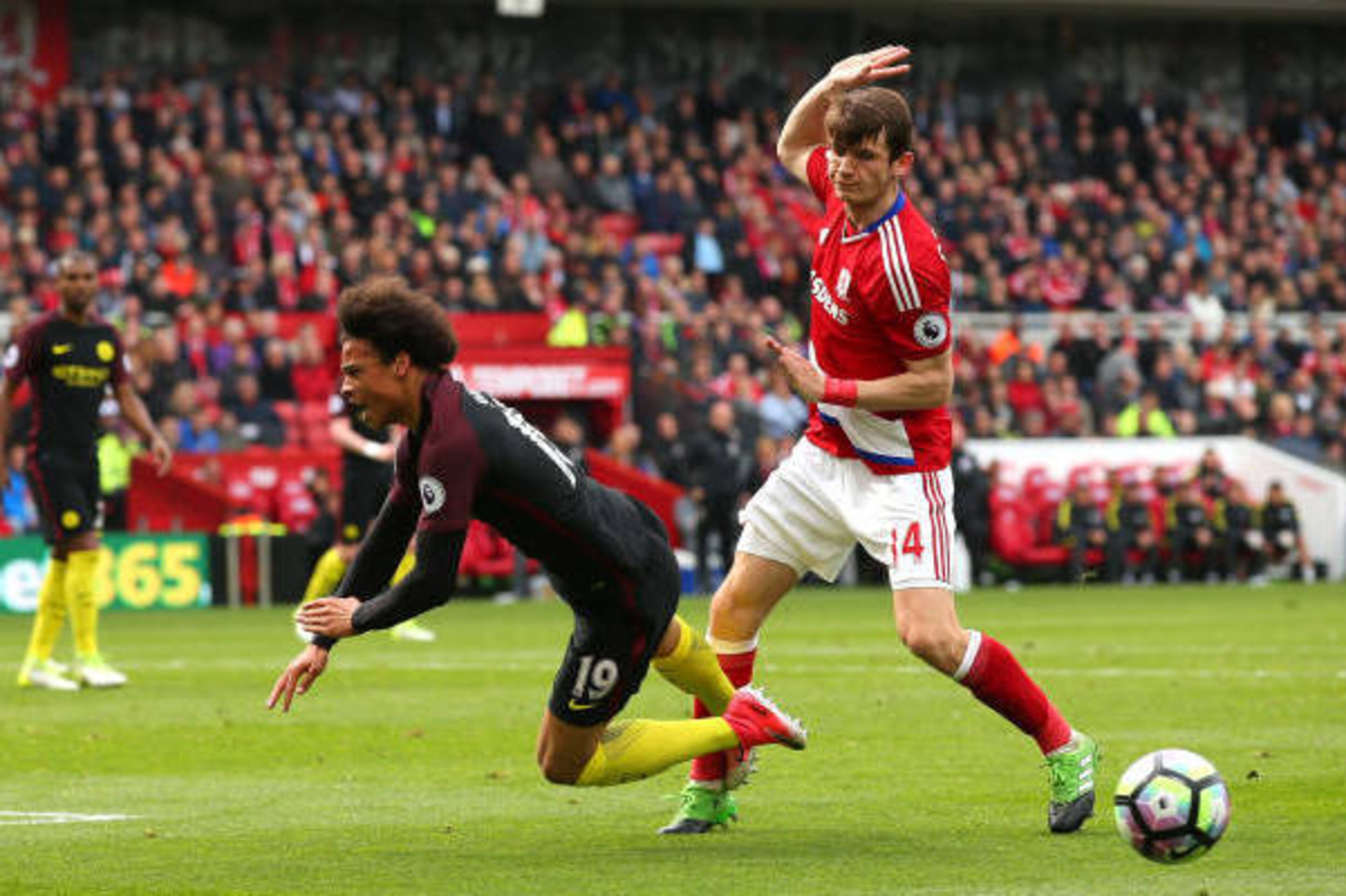 MIDDLESBROUGH, ENGLAND - APRIL 30:  Leroy Sane of Manchester City is fouled by Marten de Roon of Middlesbrough in the box and a penalty is awarded to Manchester City during the Premier League match between Middlesbrough and Manchester City at the Riversid