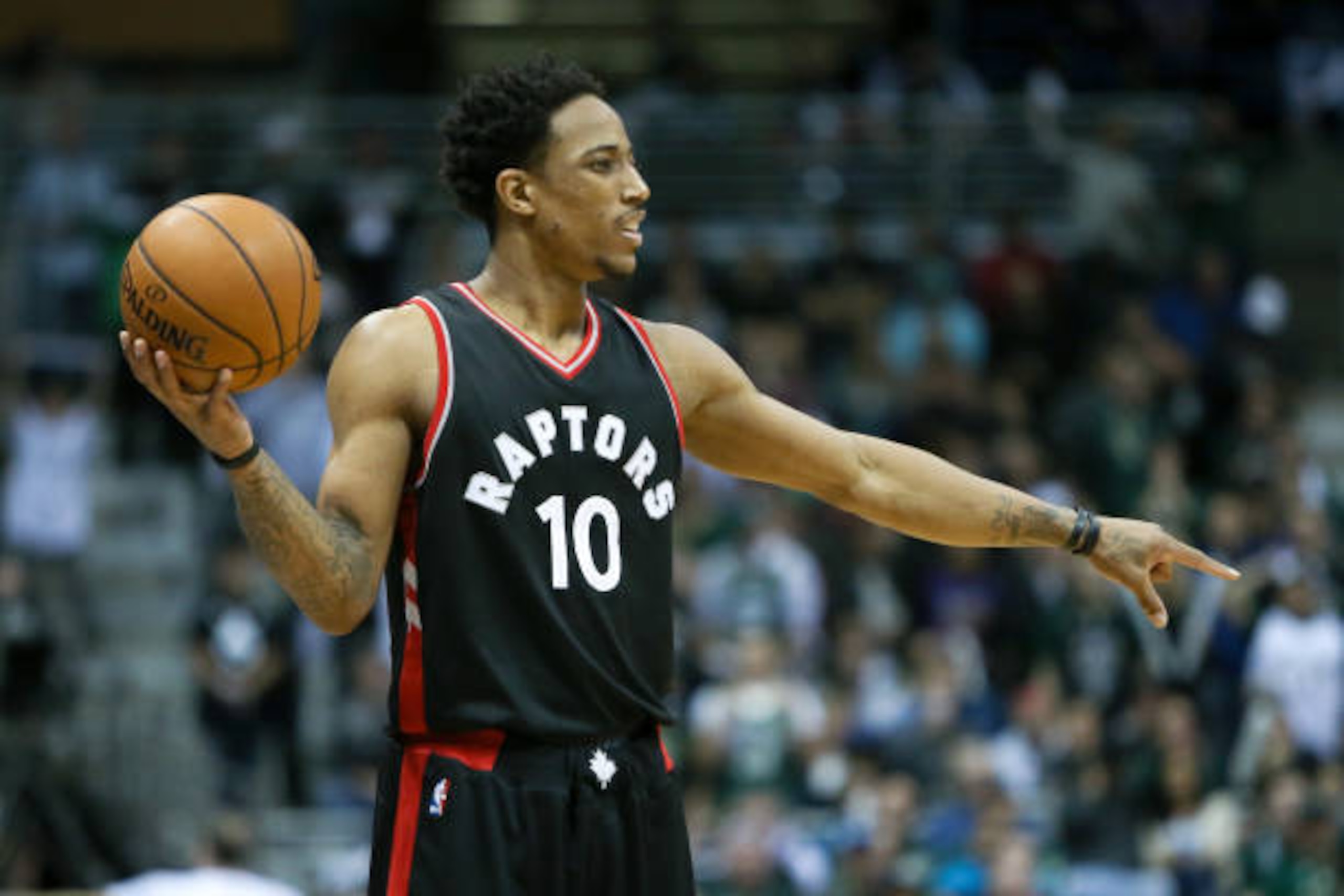 MILWAUKEE, WI - APRIL 27:  DeMar DeRozan #10 of the Toronto Raptors handles the ball in the fourth quarter in Game Six of the Eastern Conference Quarterfinals against the Milwaukee Bucks during the 2017 NBA Playoffs at BMO Harris Bradley Center on April 2