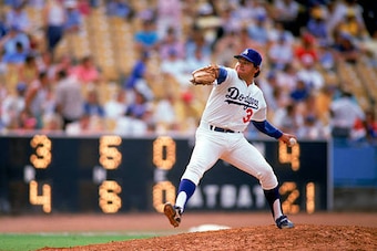 LOS ANGELES:  Fernando Valenzuela #34 of the Los Angeles Dodgers pitches during a game at Dodger Stadium in Los Angeles, California. Valenzuela played for the Dodgers from 1980-1990. (Photo by Ron Vesely/MLB Photos via Getty Images)