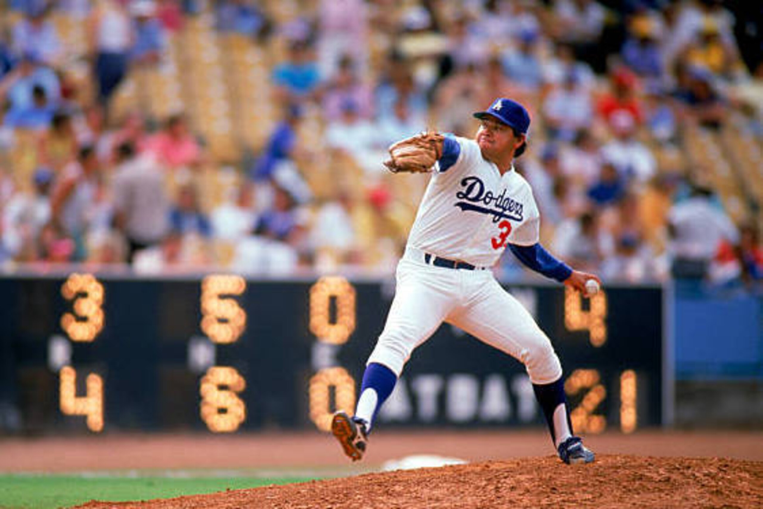 LOS ANGELES:  Fernando Valenzuela #34 of the Los Angeles Dodgers pitches during a game at Dodger Stadium in Los Angeles, California. Valenzuela played for the Dodgers from 1980-1990. (Photo by Ron Vesely/MLB Photos via Getty Images)