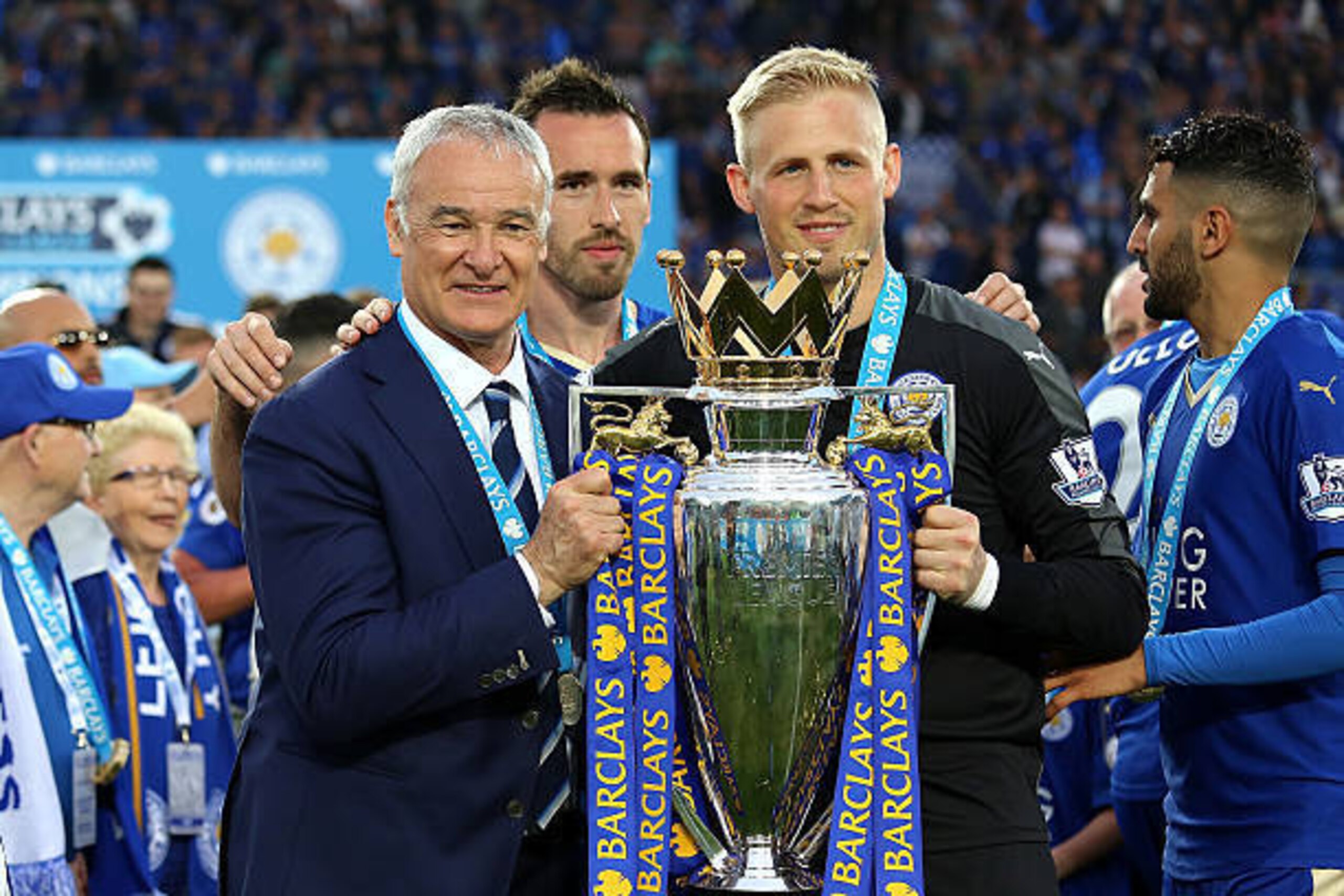 LEICESTER, ENGLAND - MAY 07: Manager/Head Coach of Leicester City Claudio Ranieri and Kasper Schmeichel
hold the Premier League Trophy as Leicester City celebrate becoming Premier League Champions for the 2015/16 Season at the end of the Barclays Premie LEICESTER, ENGLAND - MAY 07: Manager/Head Coach of Leicester City Claudio Ranieri and Kasper Schmeichel
hold the Premier League Trophy as Leicester City celebrate becoming Premier League Champions for the 2015/16 Season at the end of the Barclays Premie