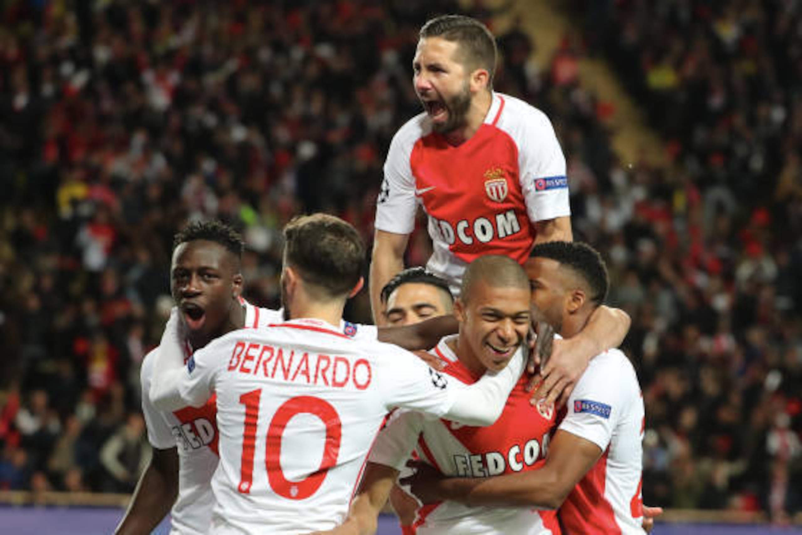 MONACO, MONACO - APRIL 19:  Kylian Mbappe of AS Monaco celebrates his goal with teammattes during the UEFA Champions League Quarter Final second leg between AS Monaco and Borussia Dortmund at Stade Louis II on April 19, 2017 in Monaco, Monaco.  (Photo by 