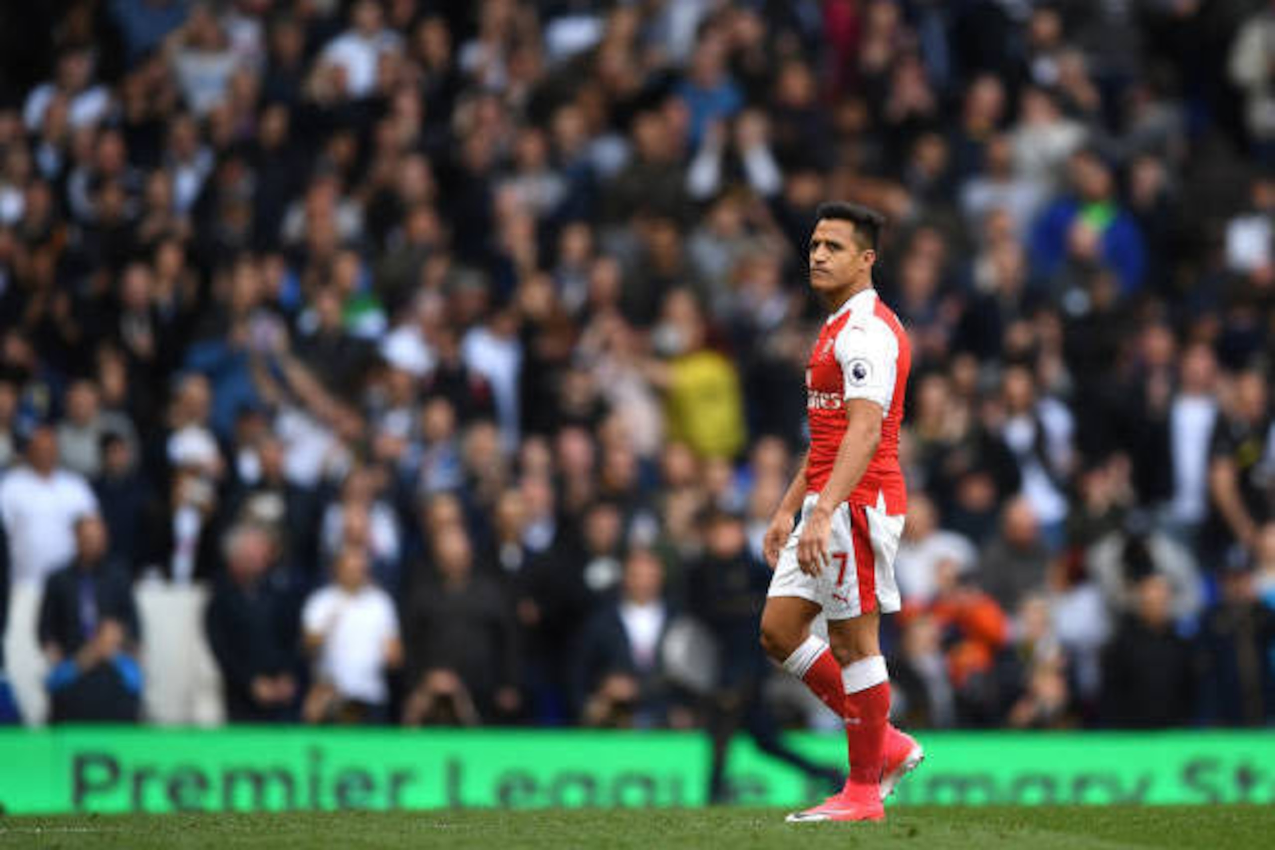 LONDON, ENGLAND - APRIL 30:  Alexis Sanchez ofArsenal looks dejected after the Premier League match between Tottenham Hotspur and Arsenal at White Hart Lane on April 30, 2017 in London, England.  (Photo by Shaun Botterill/Getty Images)