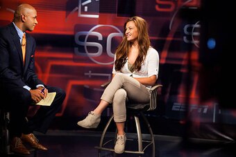 BRISTOL, CT - AUGUST 1: UFC bantamweight fighter Miesha Tate is interviewed by Sportscenter anchor Jorge Andres at ESPN's headquarters on August 1, 2013, in Bristol, Connecticut. Tate will battle bantamweight champion Ronda Rousey in December for the titl