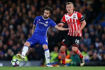 LONDON, ENGLAND - APRIL 25: Cesc Fabregas of Chelsea and James Ward-Prowse of Southampton during the Premier League match between Chelsea and Southampton at Stamford Bridge on April 25, 2017 in London, England. (Photo by Catherine Ivill - AMA/Getty Images