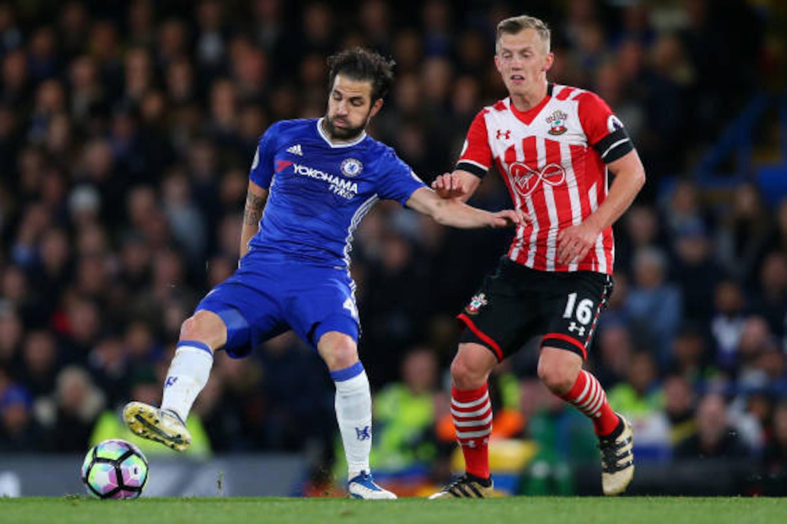 LONDON, ENGLAND - APRIL 25: Cesc Fabregas of Chelsea and James Ward-Prowse of Southampton during the Premier League match between Chelsea and Southampton at Stamford Bridge on April 25, 2017 in London, England. (Photo by Catherine Ivill - AMA/Getty Images