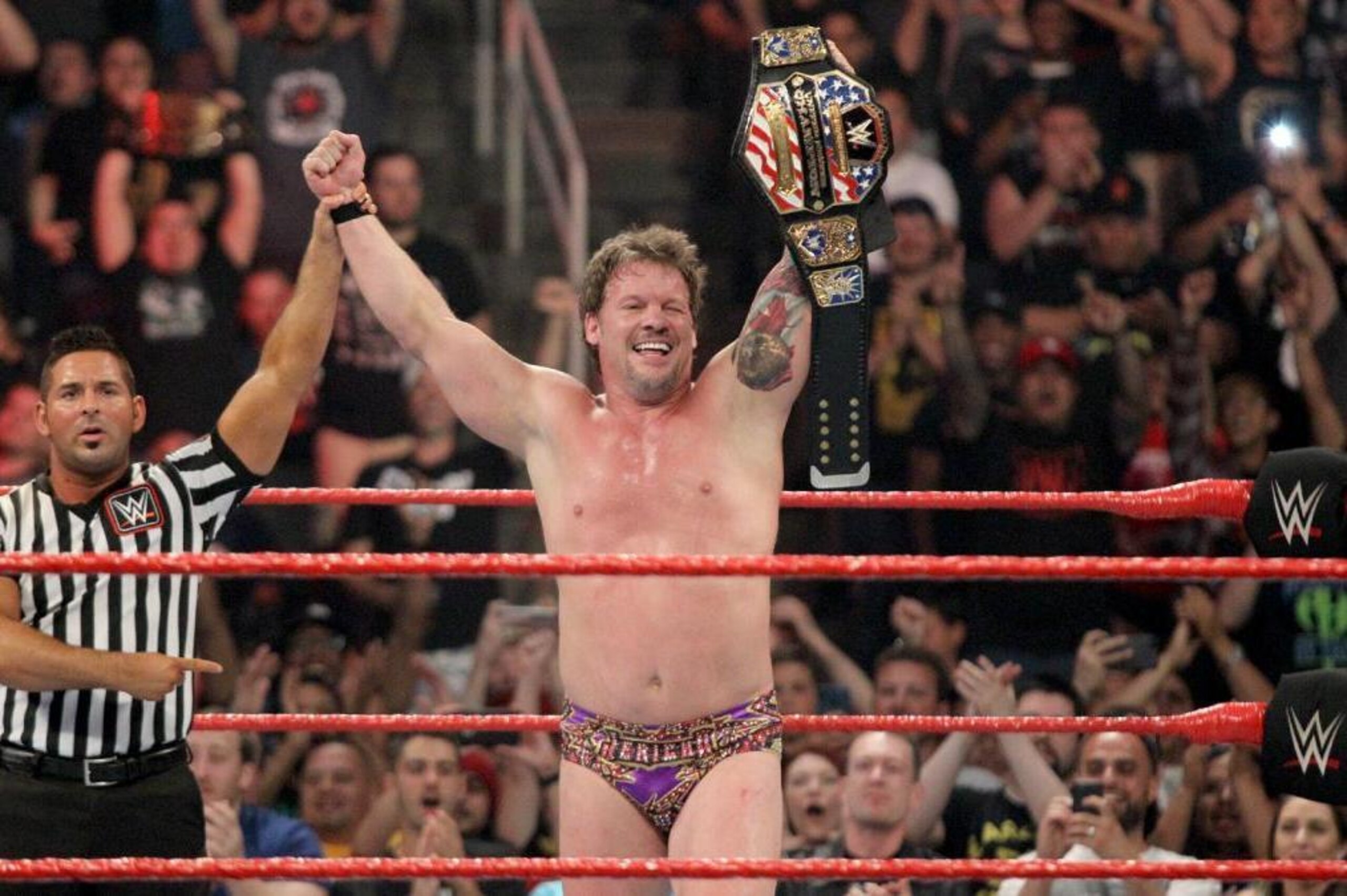 Chris Jericho celebrates recapturing the U.S. title at Payback. Chris Jericho celebrates recapturing the U.S. title at Payback.