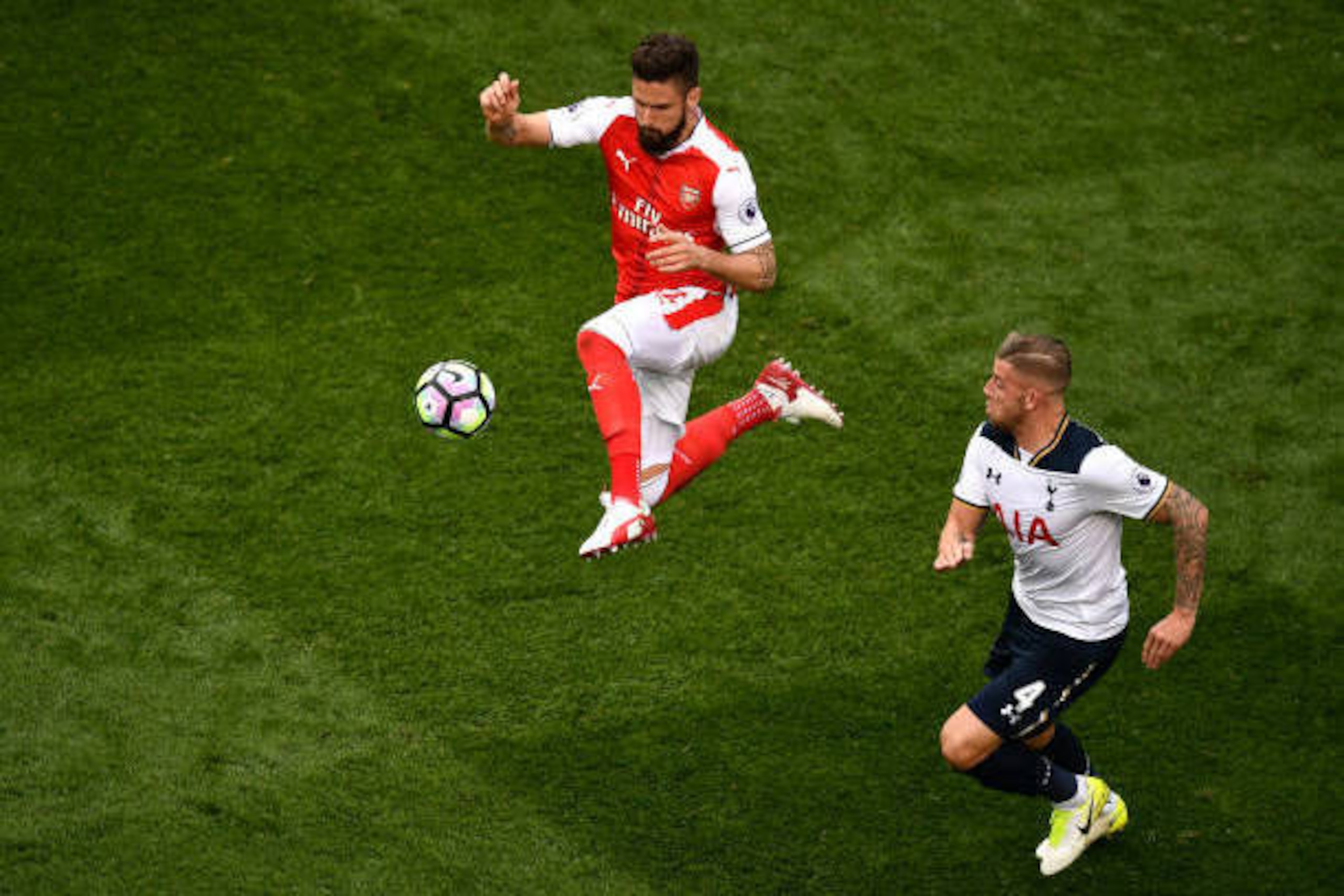 LONDON, ENGLAND - APRIL 30: Olivier Giroud of Arsenal attempts to control the ball during the Premier League match between Tottenham Hotspur and Arsenal at White Hart Lane on April 30, 2017 in London, England.  (Photo by Dan Mullan/Getty Images)