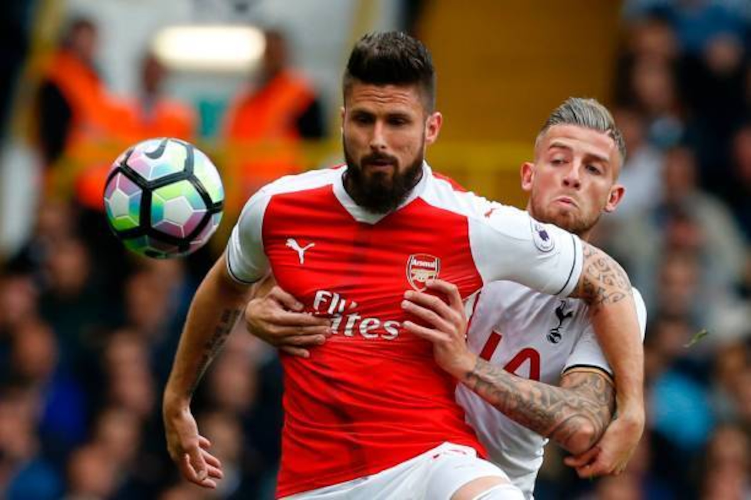Arsenal's French striker Olivier Giroud (L) vies with Tottenham Hotspur's Belgian defender Toby Alderweireld during the English Premier League football match between Tottenham Hotspur and Arsenal at White Hart Lane in London, on April 30, 2017.  / AFP PHO