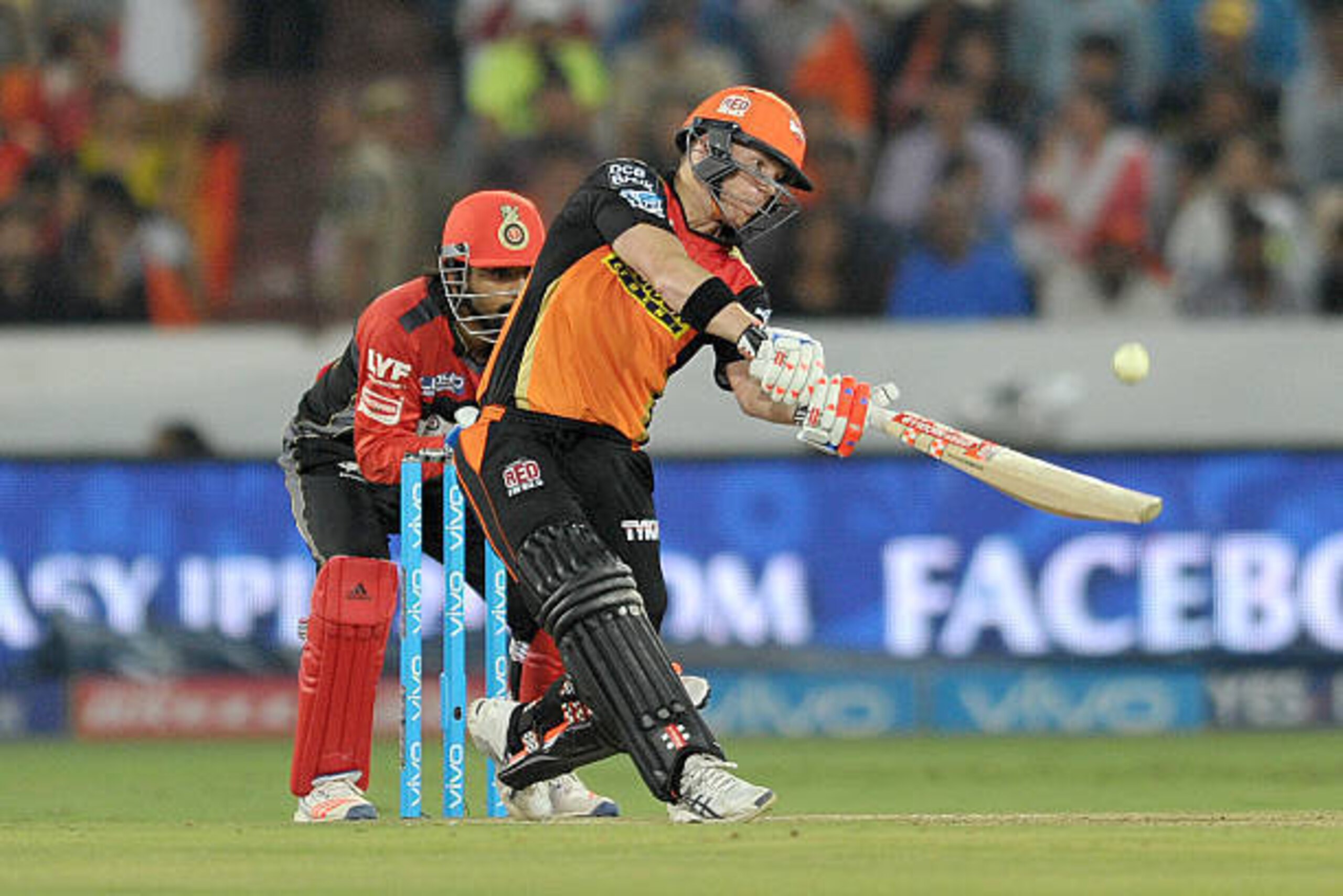 Sunrisers Hyderabad captain David Warner plays a shot during the 2016 Indian Premier League (IPL) Twenty20 cricket match between Sunrisers Hyderabad and Royal Challengers Bangalore at The Rajiv Gandhi International Stadium in Hyderabad  on April 30, 2016.