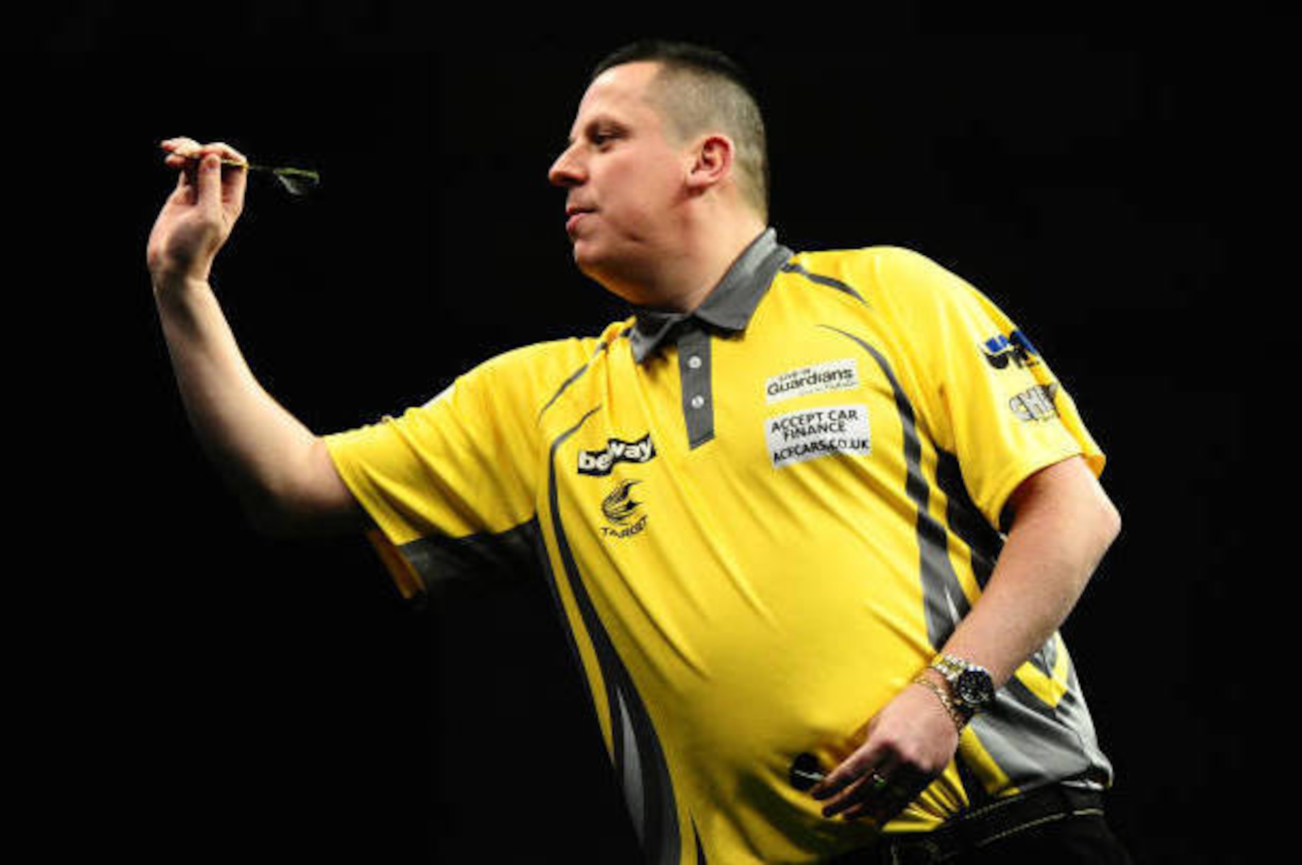 EXETER, UNITED KINGDOM - MARCH 02: Dave Chisnall throws during Night Five of the Betway Premier League Darts at Westpoint Arena on March 2, 2017 in Exeter, England. (Photo by Harry Trump/Getty Images)
